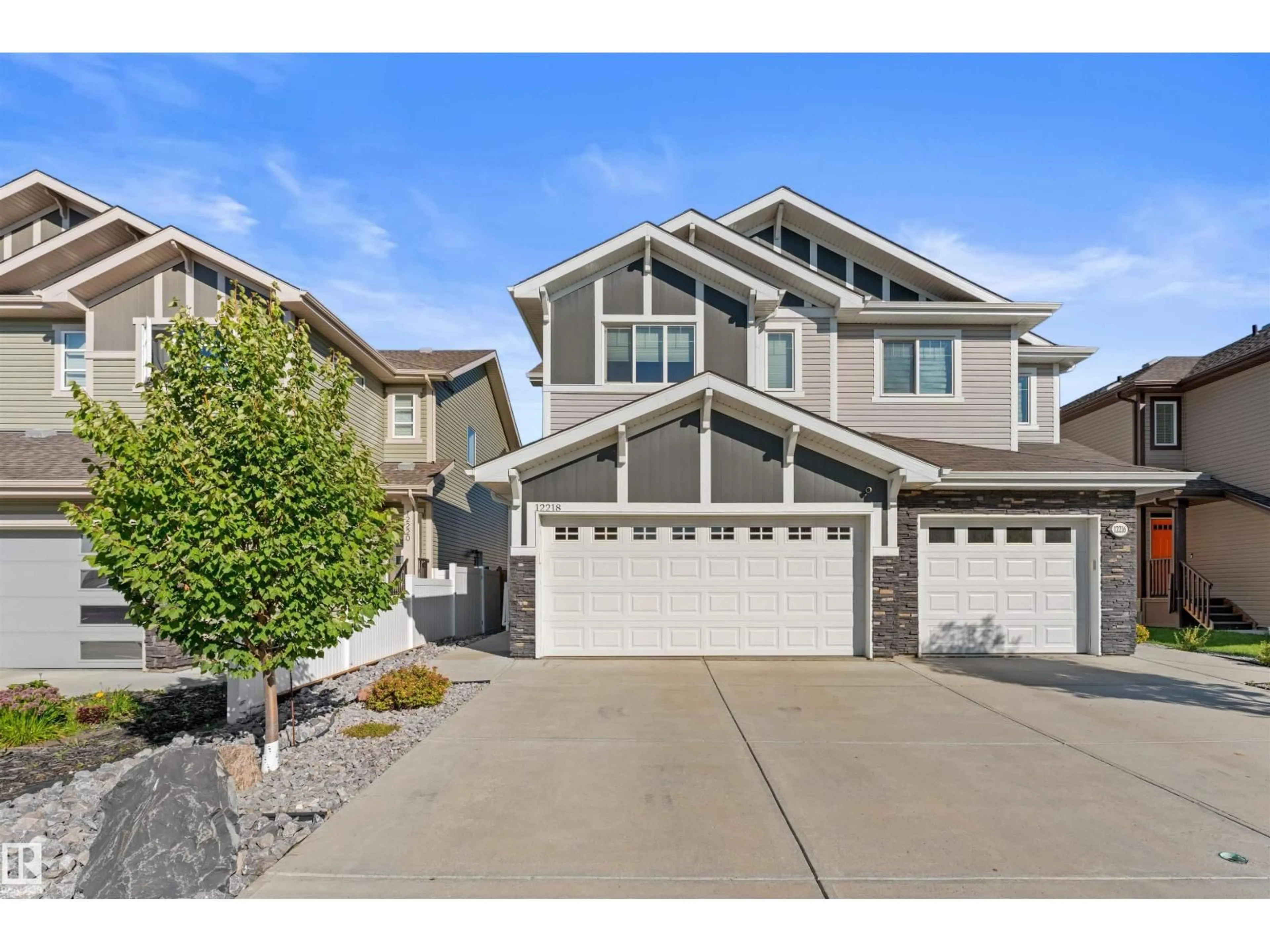 Home with vinyl exterior material, street for 12218 176 AV, Edmonton Alberta T5X0L2