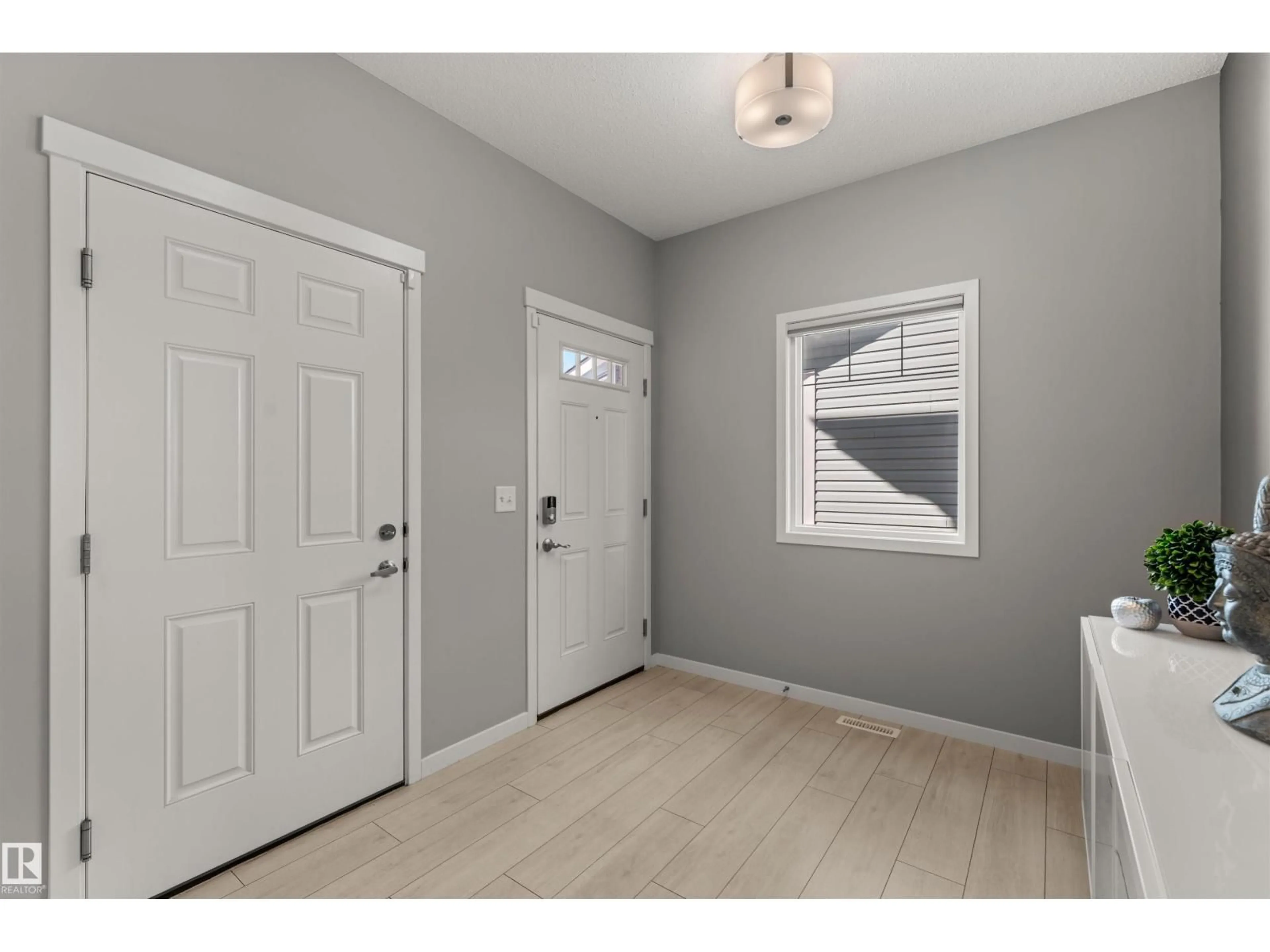 Indoor entryway for 12218 176 AV, Edmonton Alberta T5X0L2