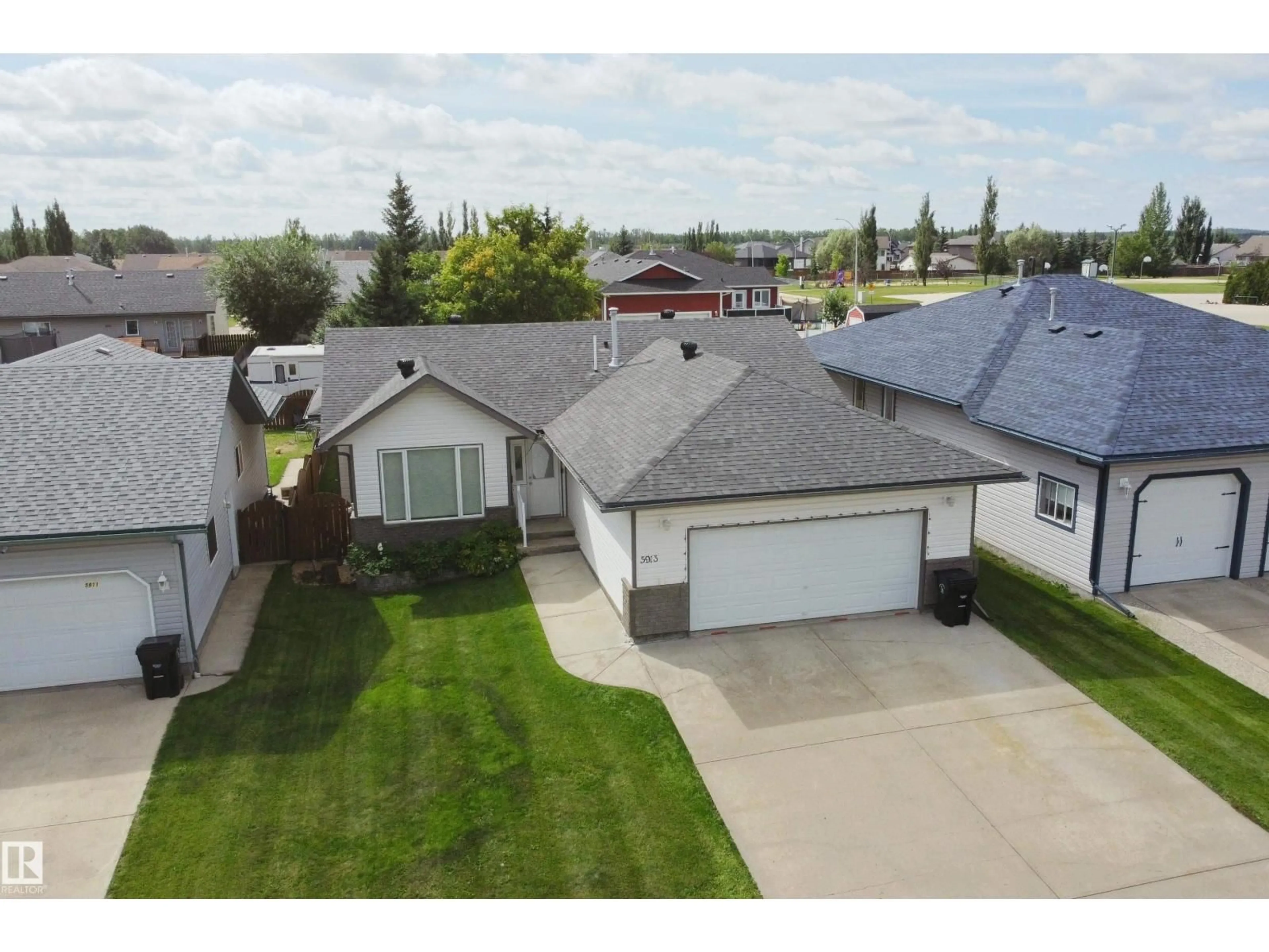 A pic from outside/outdoor area/front of a property/back of a property/a pic from drone, street for 5913 52 AVENUE, Barrhead Alberta T7N1N6