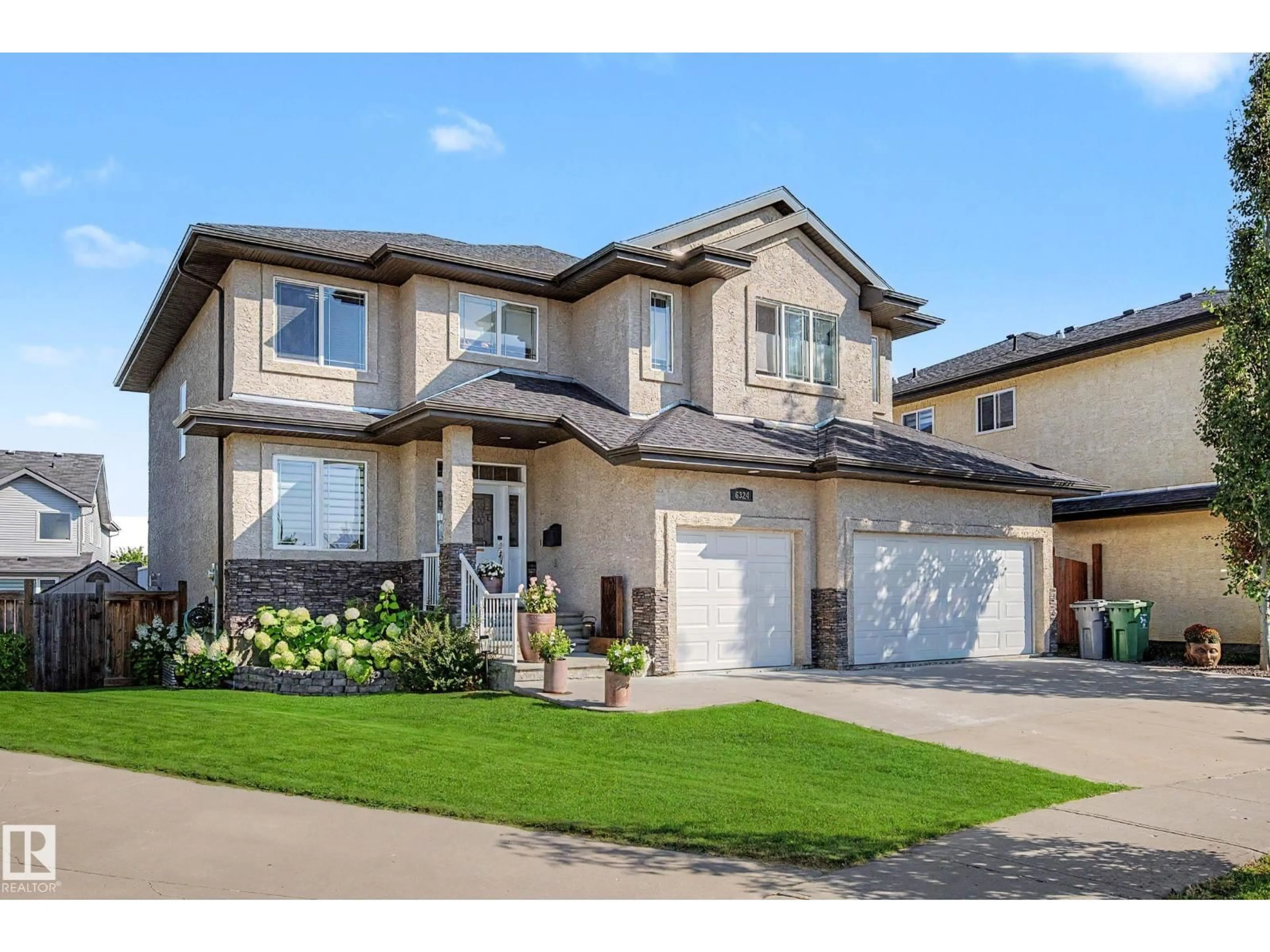 Home with vinyl exterior material, street for 6324 56 AV, Beaumont Alberta T4X0H1