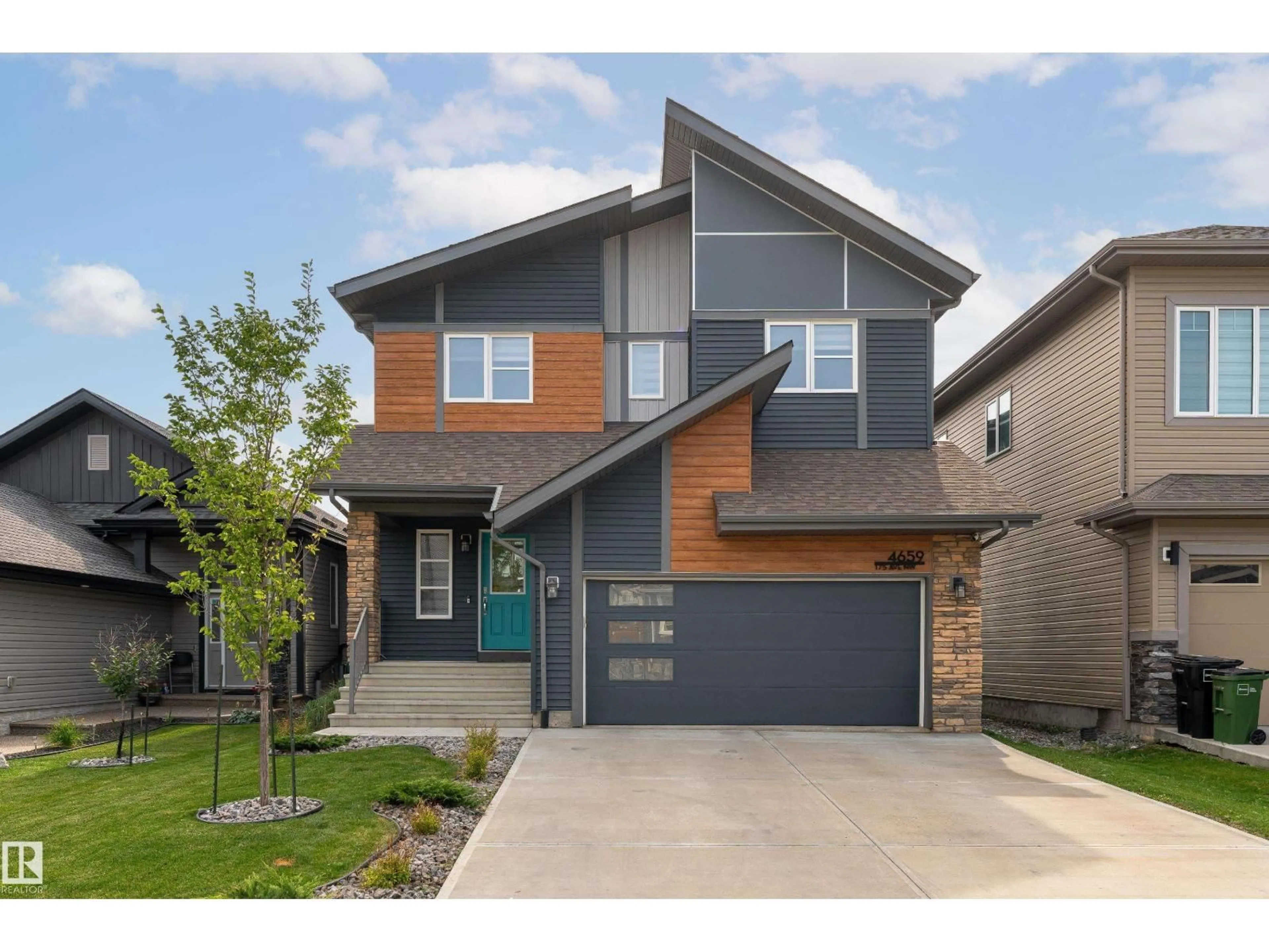 Home with brick exterior material, street for NW - 4659 175 AV, Edmonton Alberta T5Y3Z8