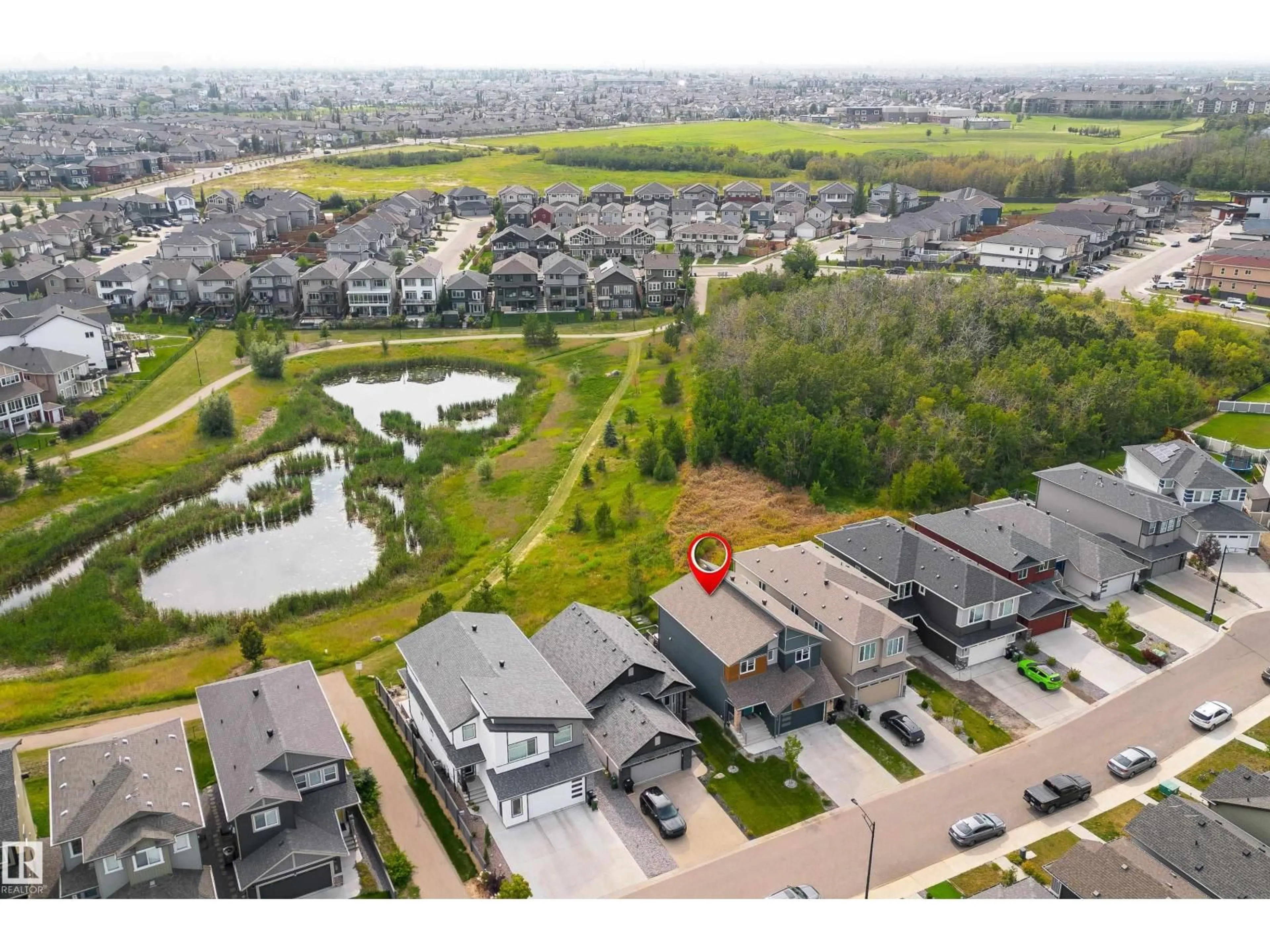 A pic from outside/outdoor area/front of a property/back of a property/a pic from drone, street for NW - 4659 175 AV, Edmonton Alberta T5Y3Z8
