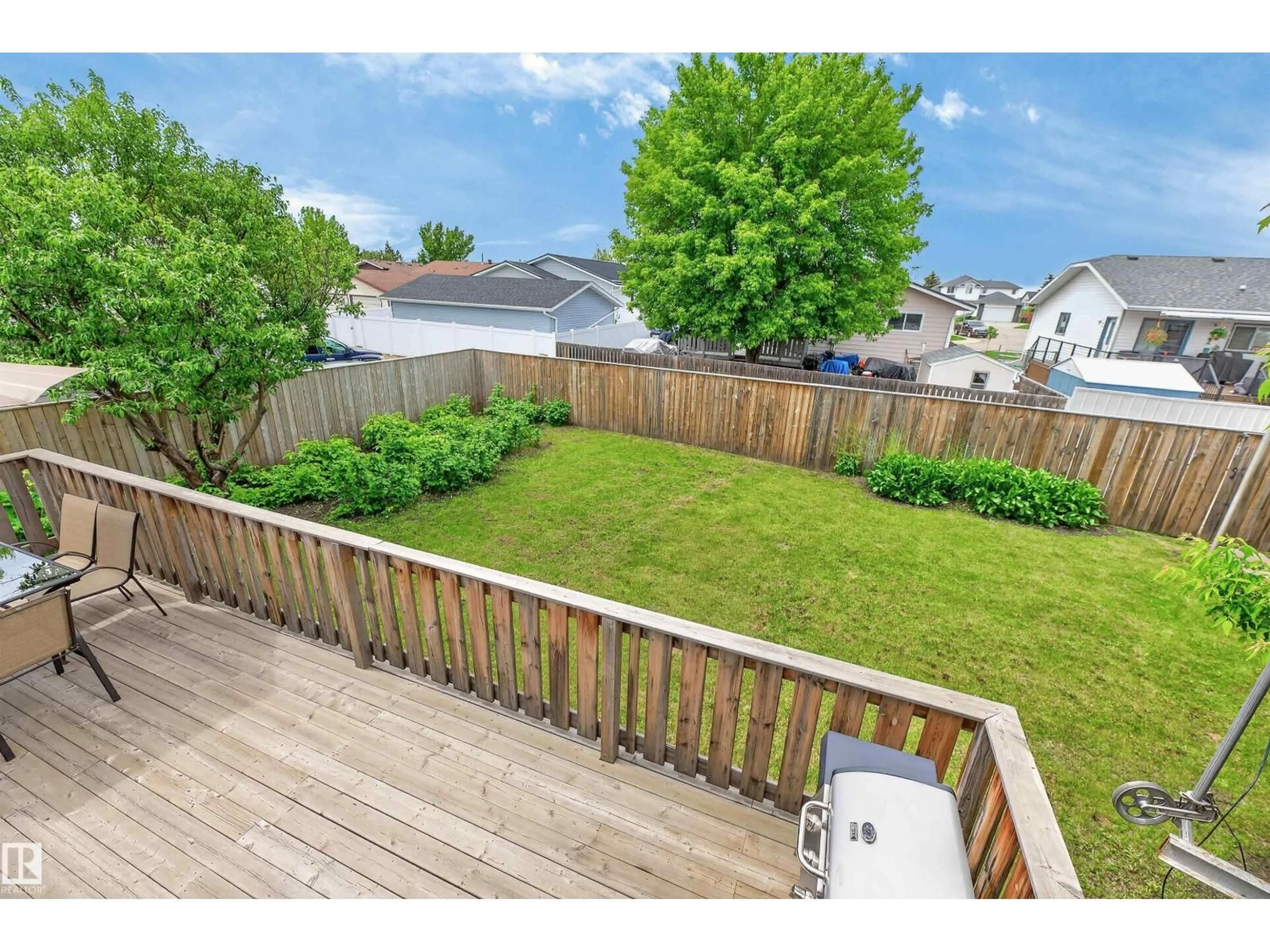 A pic from outside/outdoor area/front of a property/back of a property/a pic from drone, unknown for 5914 52 ST, Vegreville Alberta T9C1J1