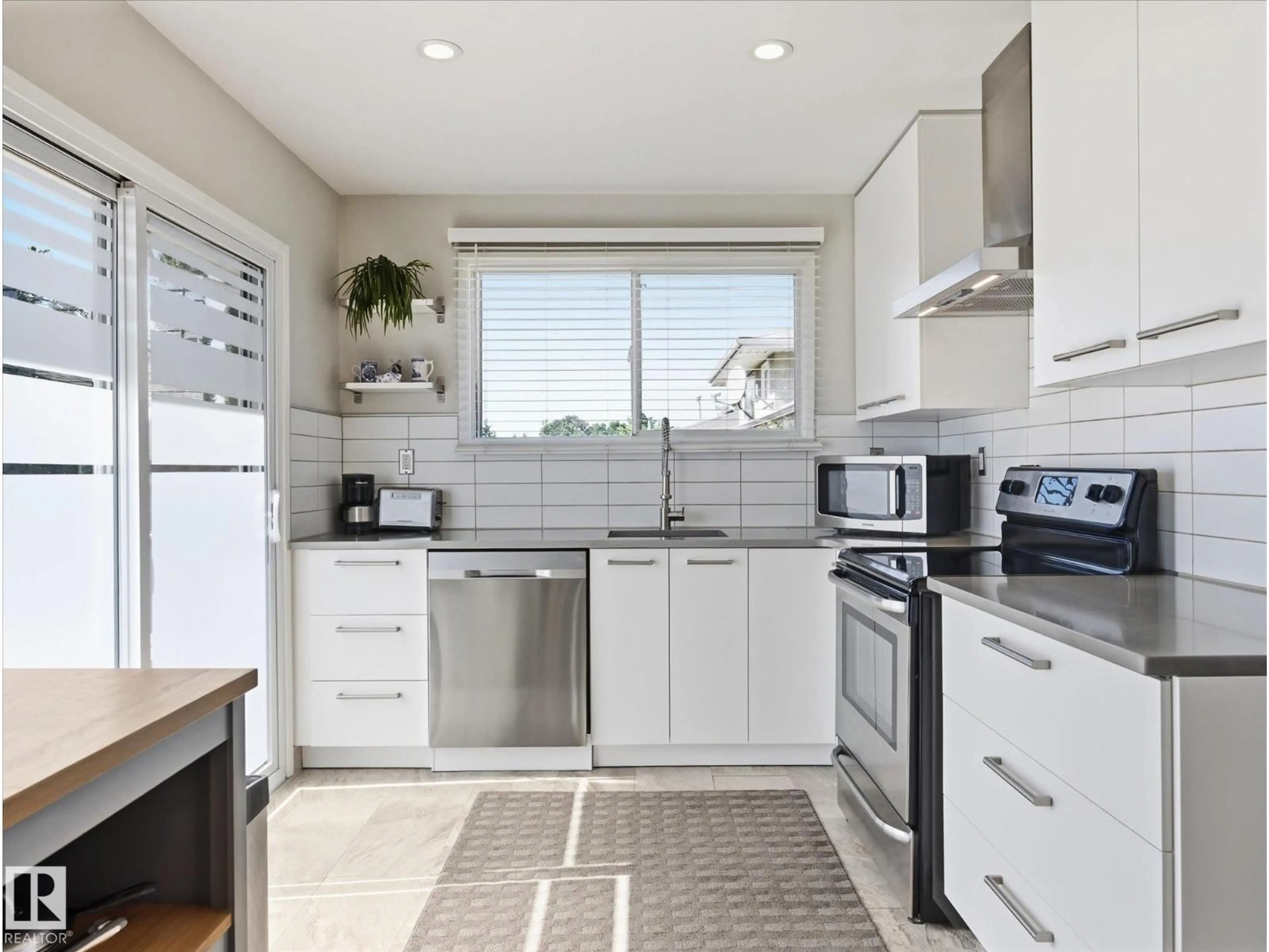 Standard kitchen, ceramic/tile floor for 7411 141 AV, Edmonton Alberta T5C2N4