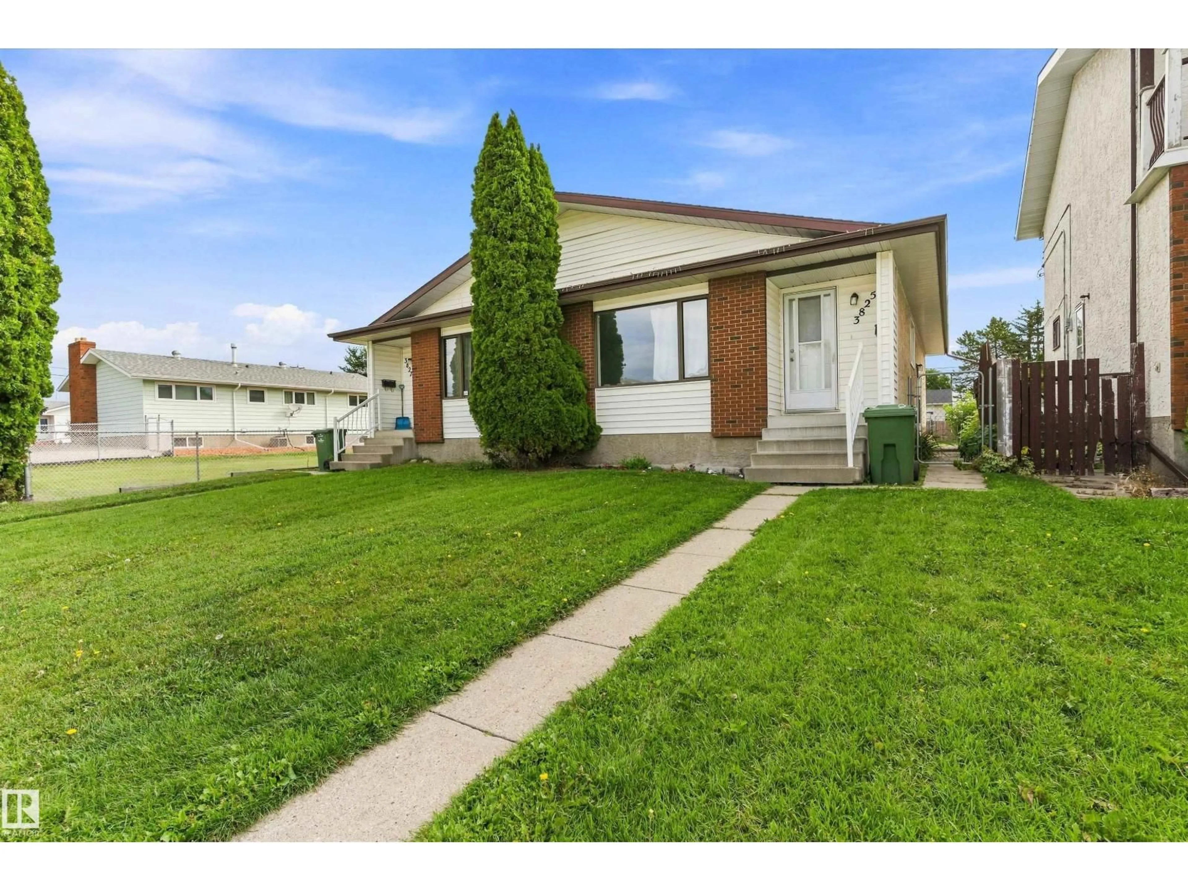 Home with vinyl exterior material, street for 3825/27 53A ST, Wetaskiwin Alberta T9A2P5