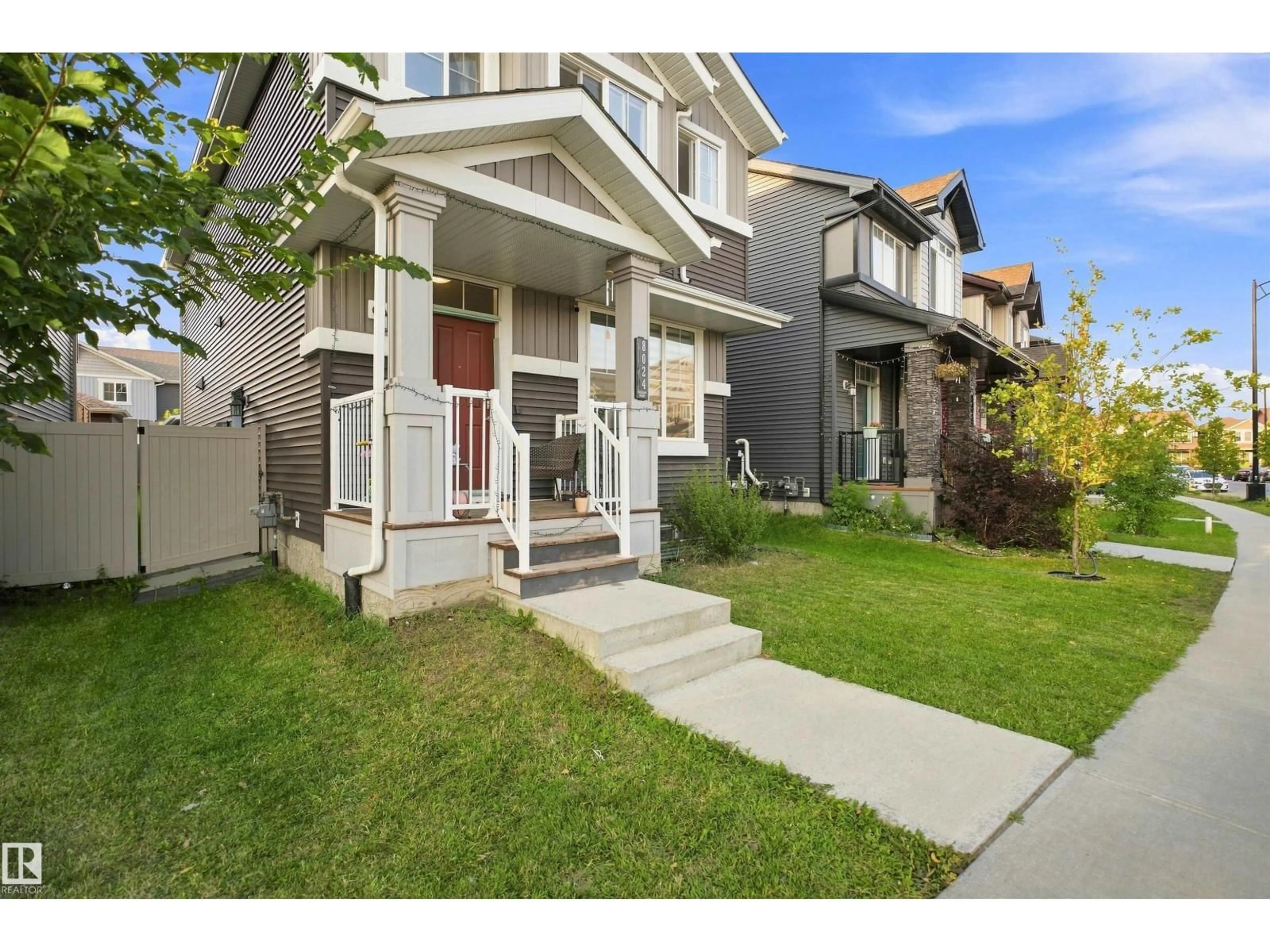 Home with vinyl exterior material, street for SW - 8024 ORCHARDS GREEN GR, Edmonton Alberta T6X2L5