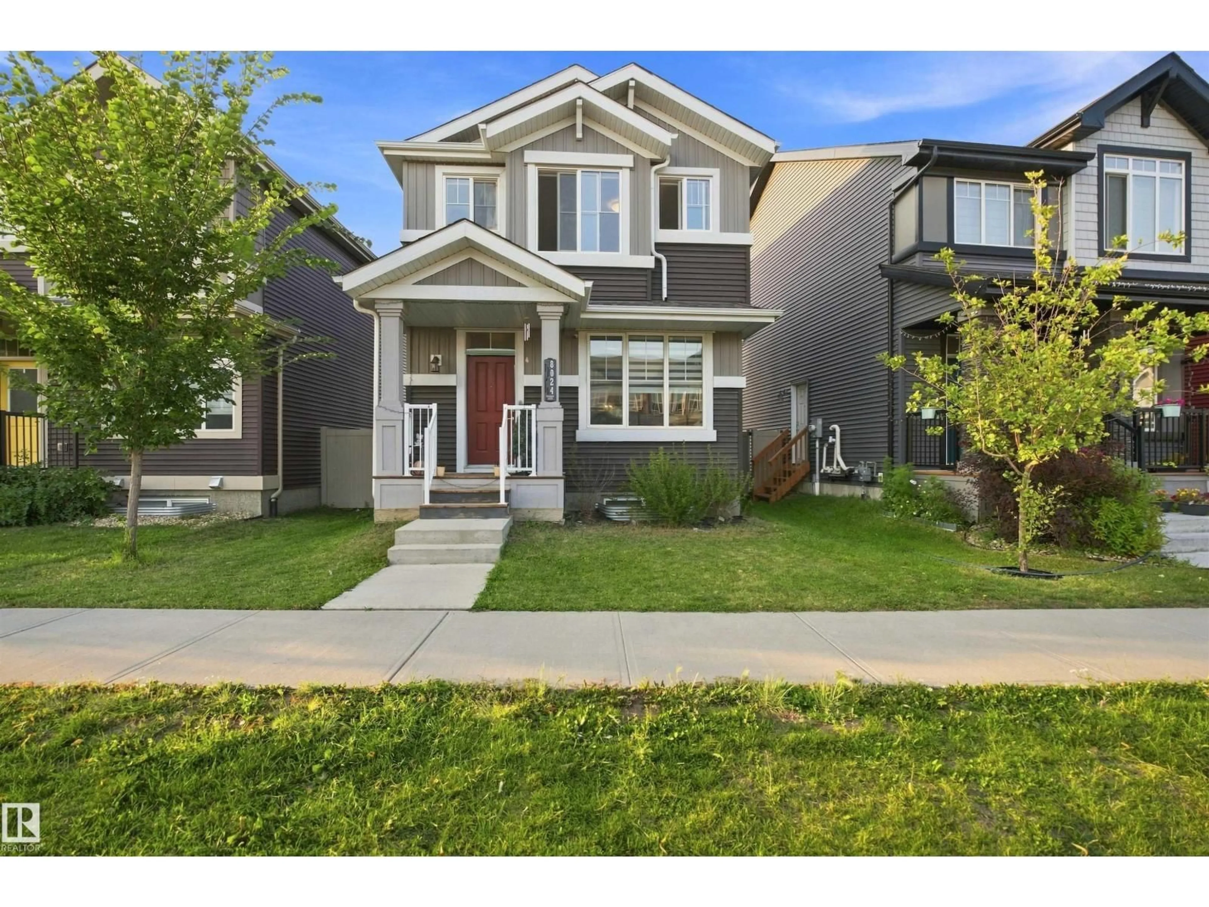 Home with vinyl exterior material, street for SW - 8024 ORCHARDS GREEN GR, Edmonton Alberta T6X2L5
