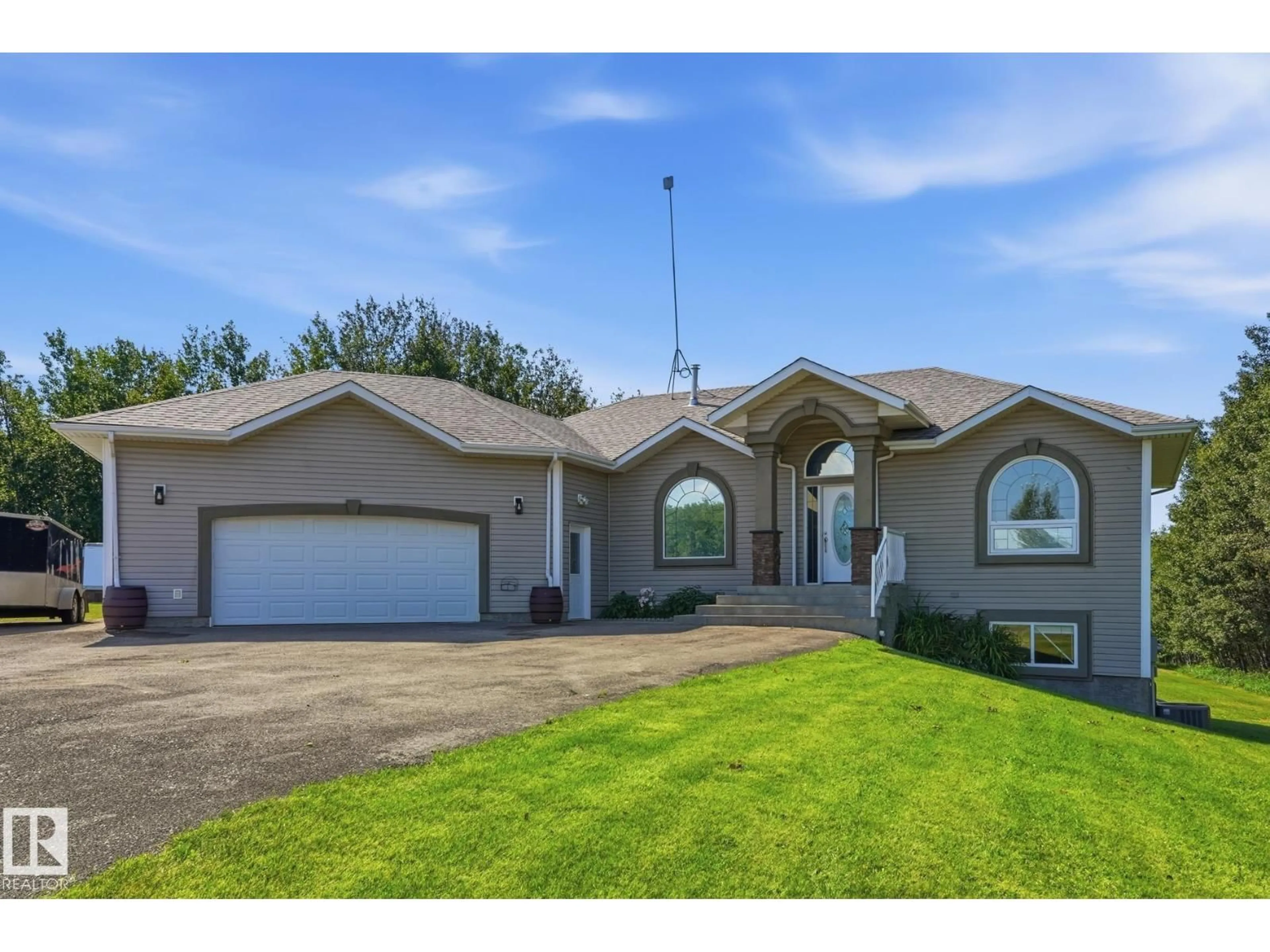 Home with vinyl exterior material, street for 20212 - 433 TWP ROAD 510, Rural Strathcona County Alberta T8G1E4