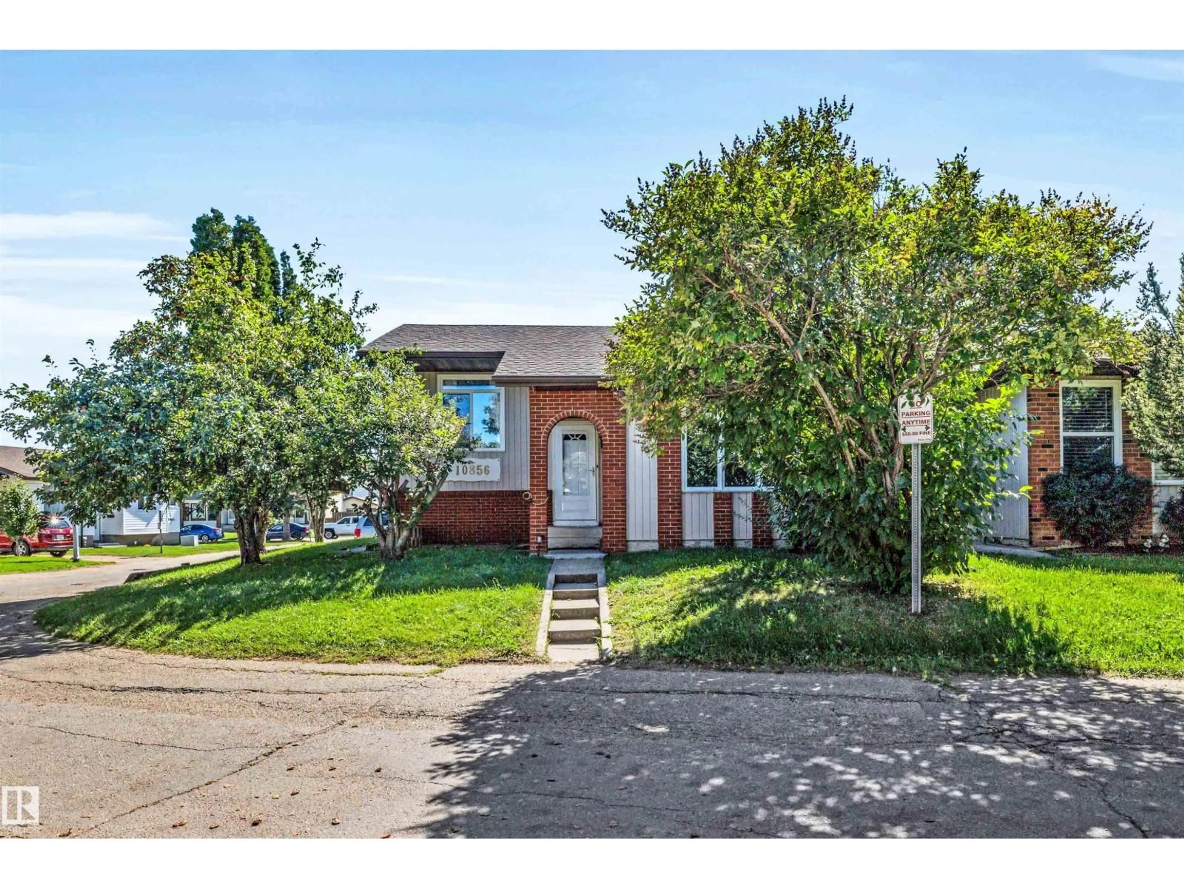 Home with brick exterior material, street for NW - 10856 173 AV, Edmonton Alberta T5X3Z4