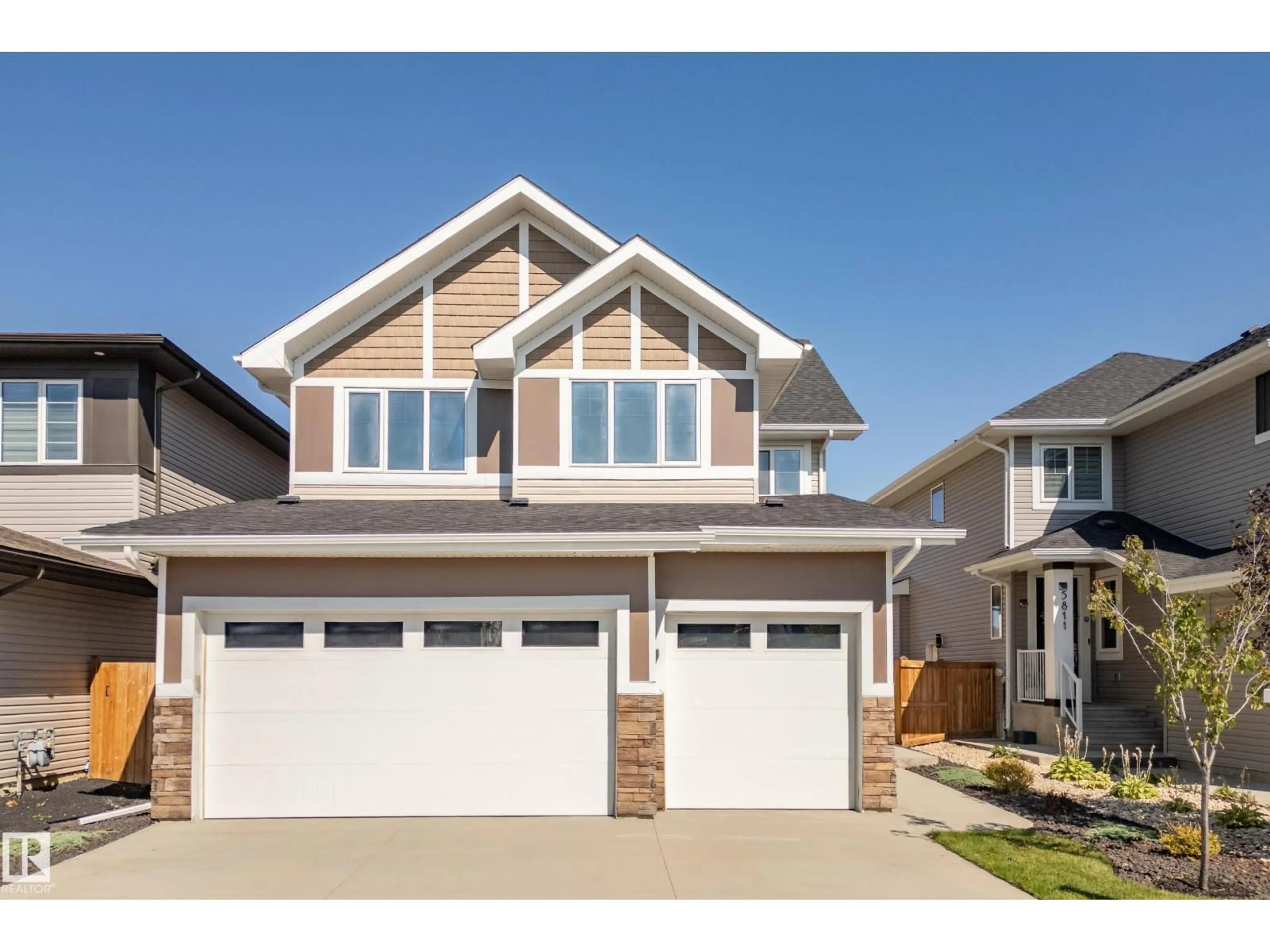 Home with vinyl exterior material, street for 5813 PELERIN CR, Beaumont Alberta T4X2X8