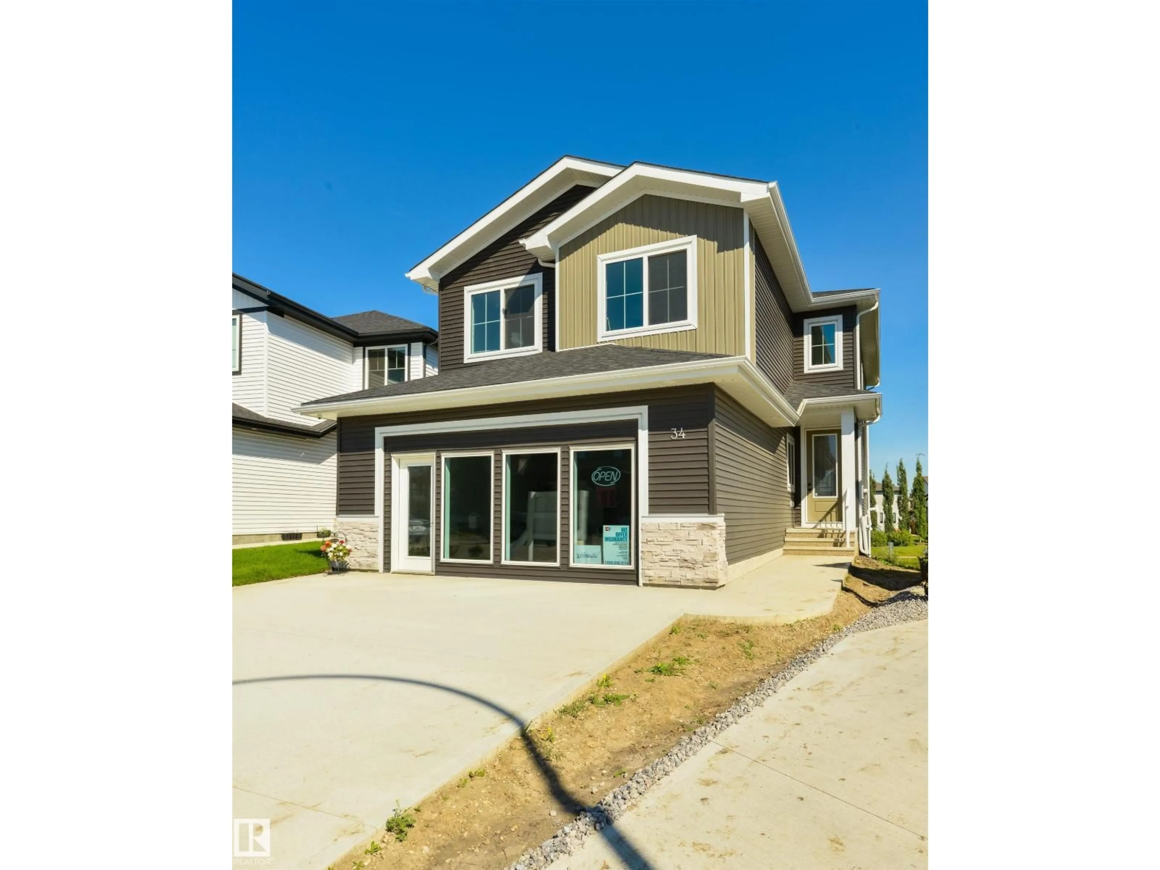 Home with vinyl exterior material, street for 34 HARLEY WY, Spruce Grove Alberta T7X0X4