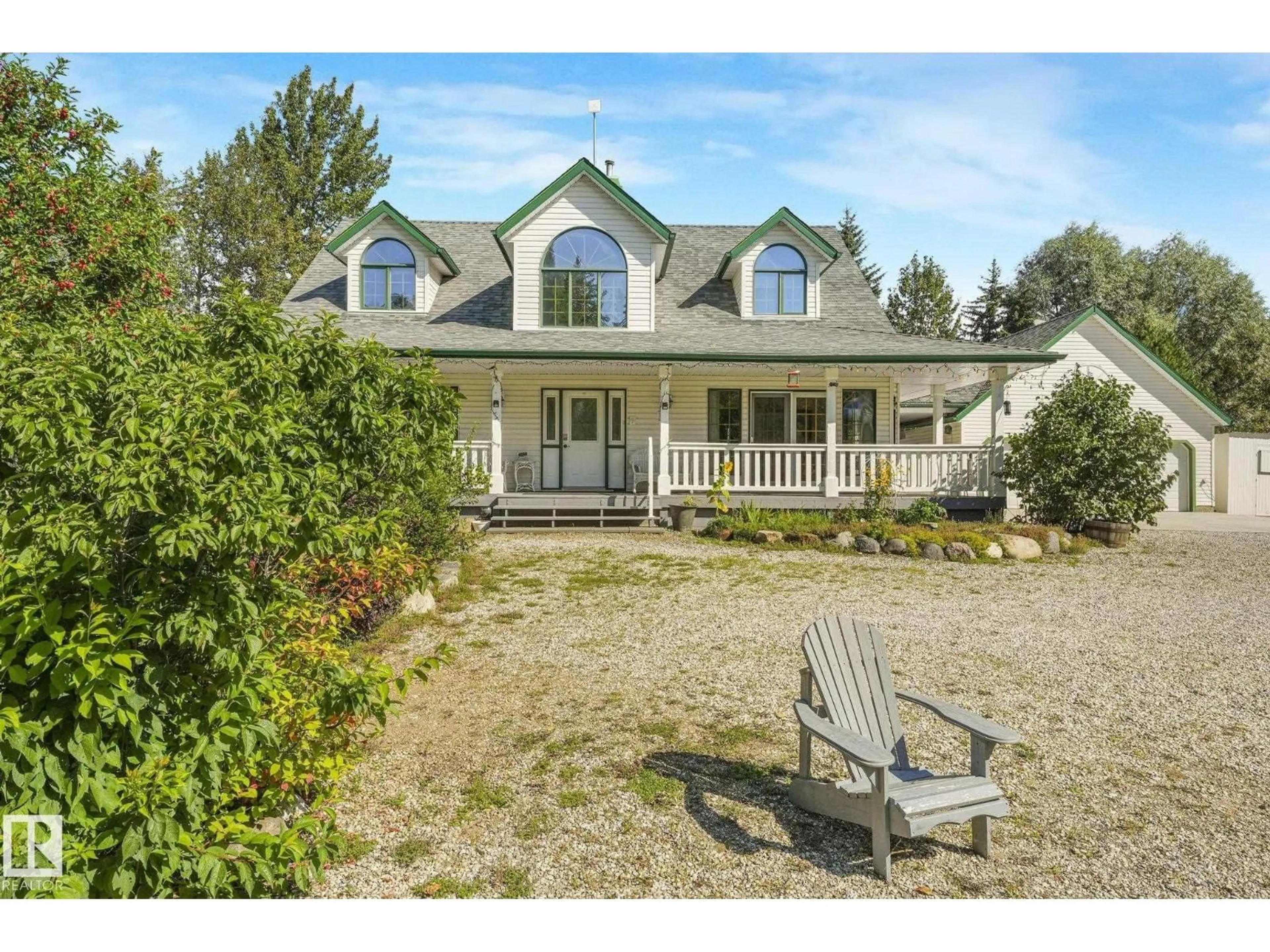 A pic from outside/outdoor area/front of a property/back of a property/a pic from drone, mountain view for #101 - 27019 TWP ROAD 514, Rural Parkland County Alberta T7Y1G6