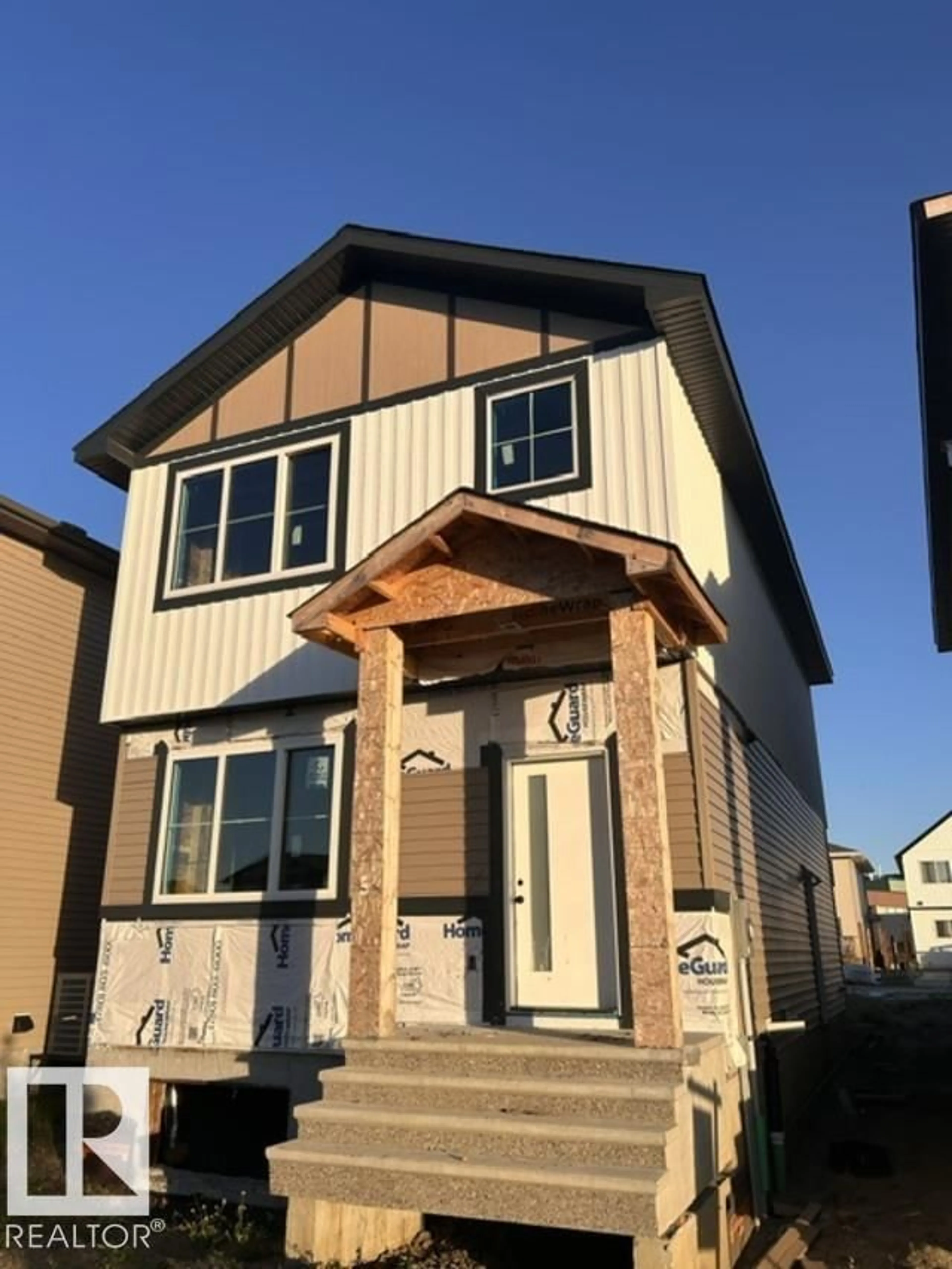 Home with vinyl exterior material, street for 10209 92A AV, Morinville Alberta T8R2R4