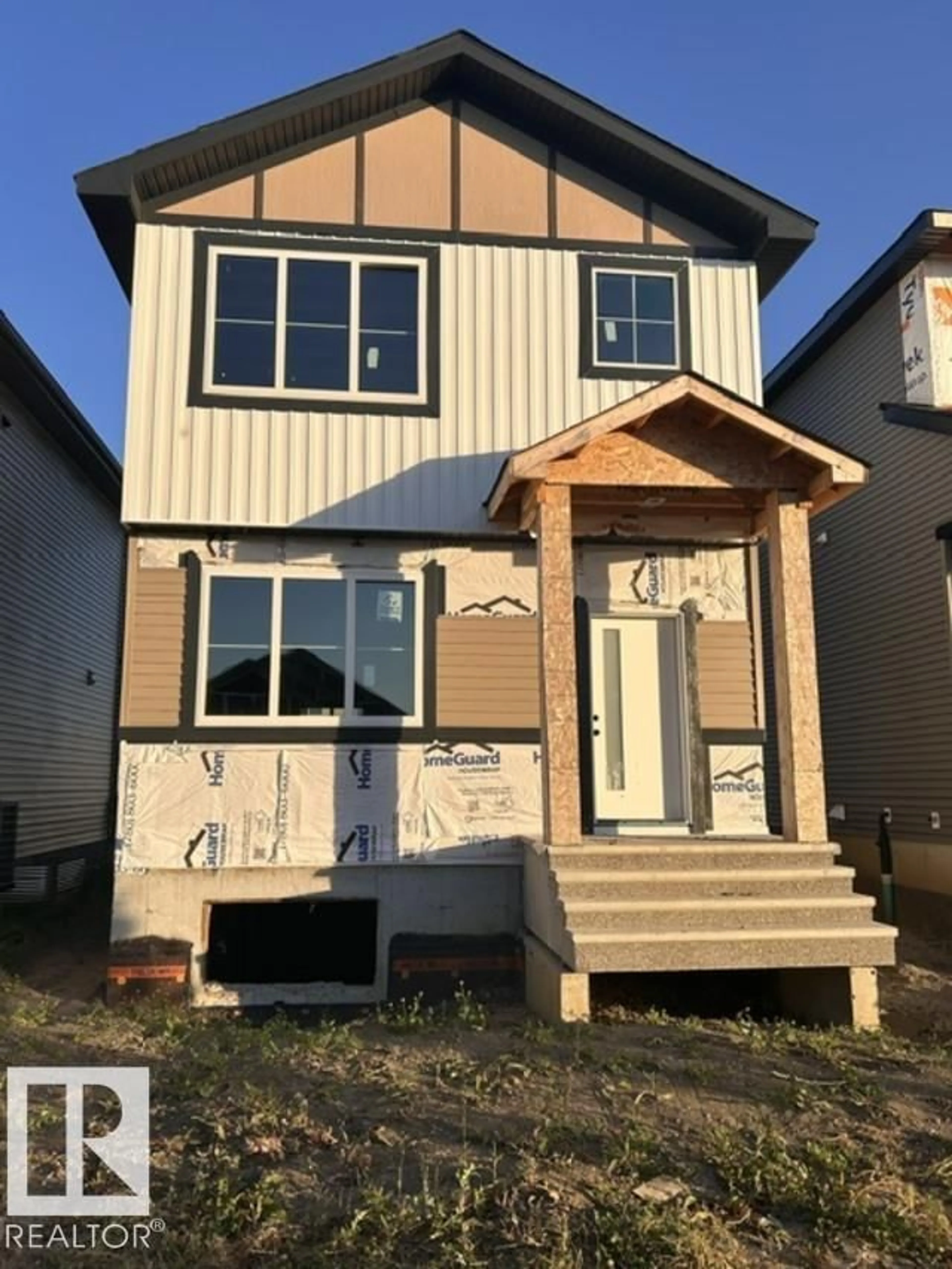 Home with vinyl exterior material, street for 10209 92A AV, Morinville Alberta T8R2R4