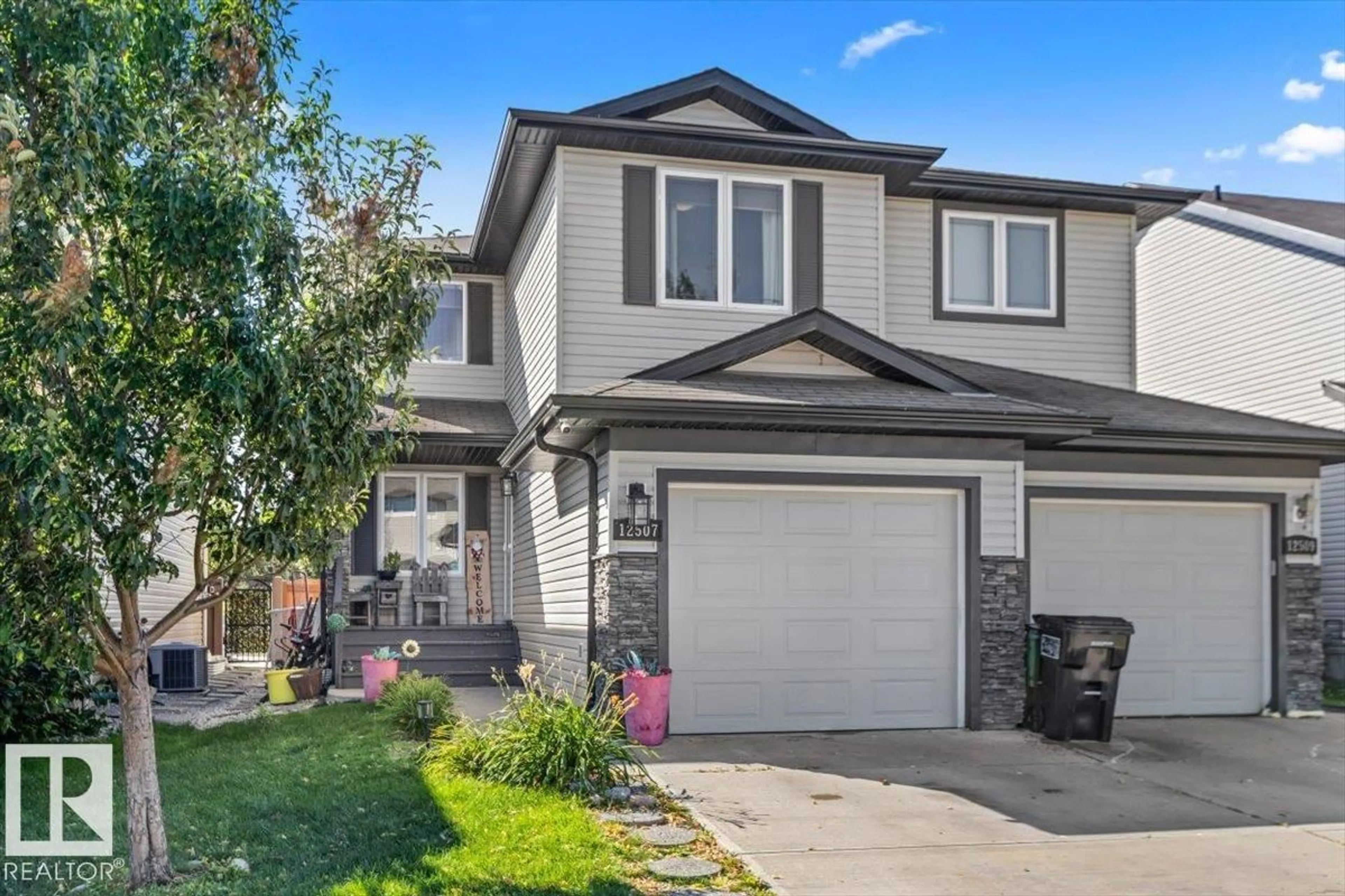 Home with vinyl exterior material, street for 12507 171 AV, Edmonton Alberta T5X0E5
