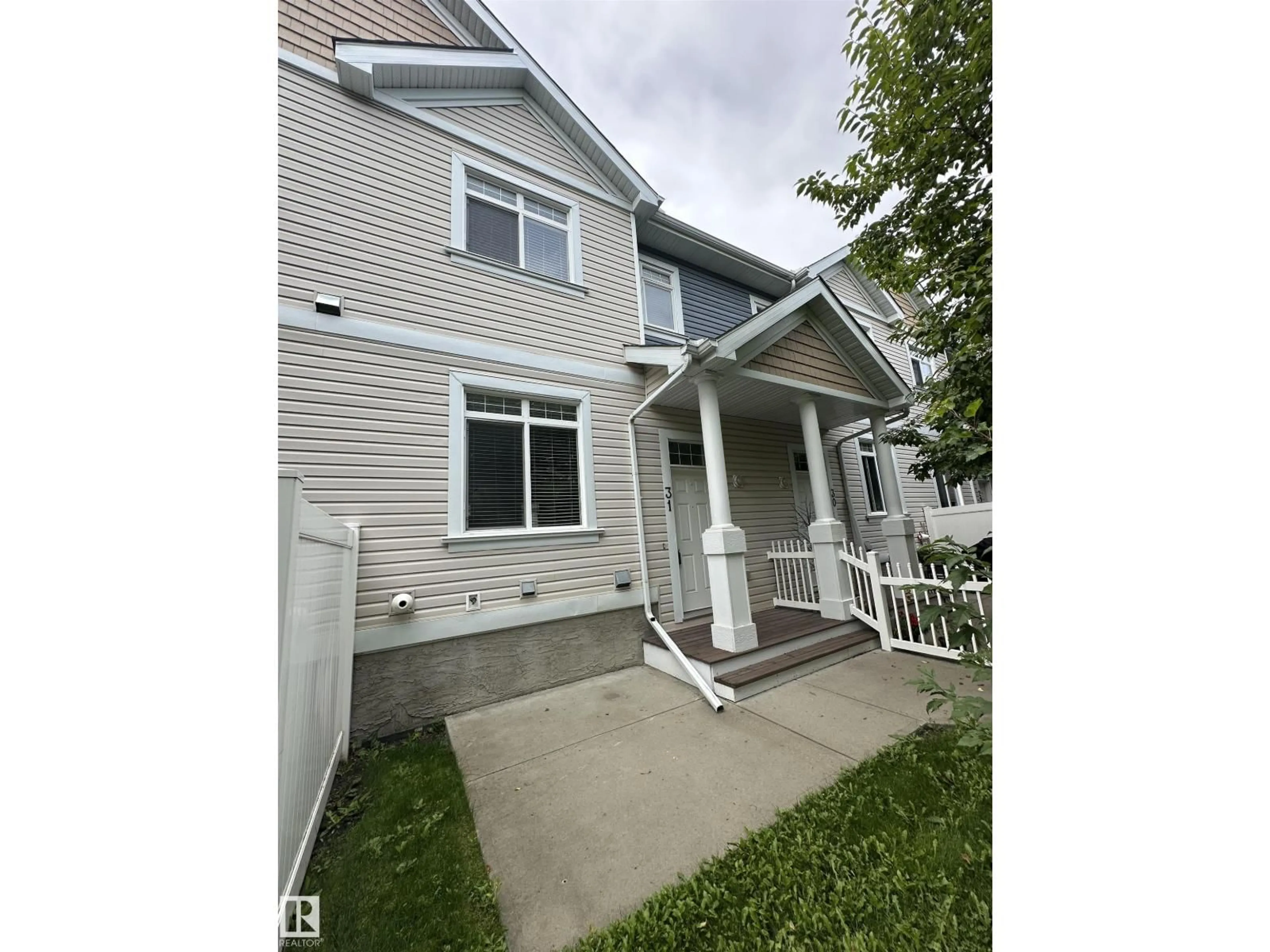 Home with vinyl exterior material, street for #31 - 1804 70 ST, Edmonton Alberta T6X0H4