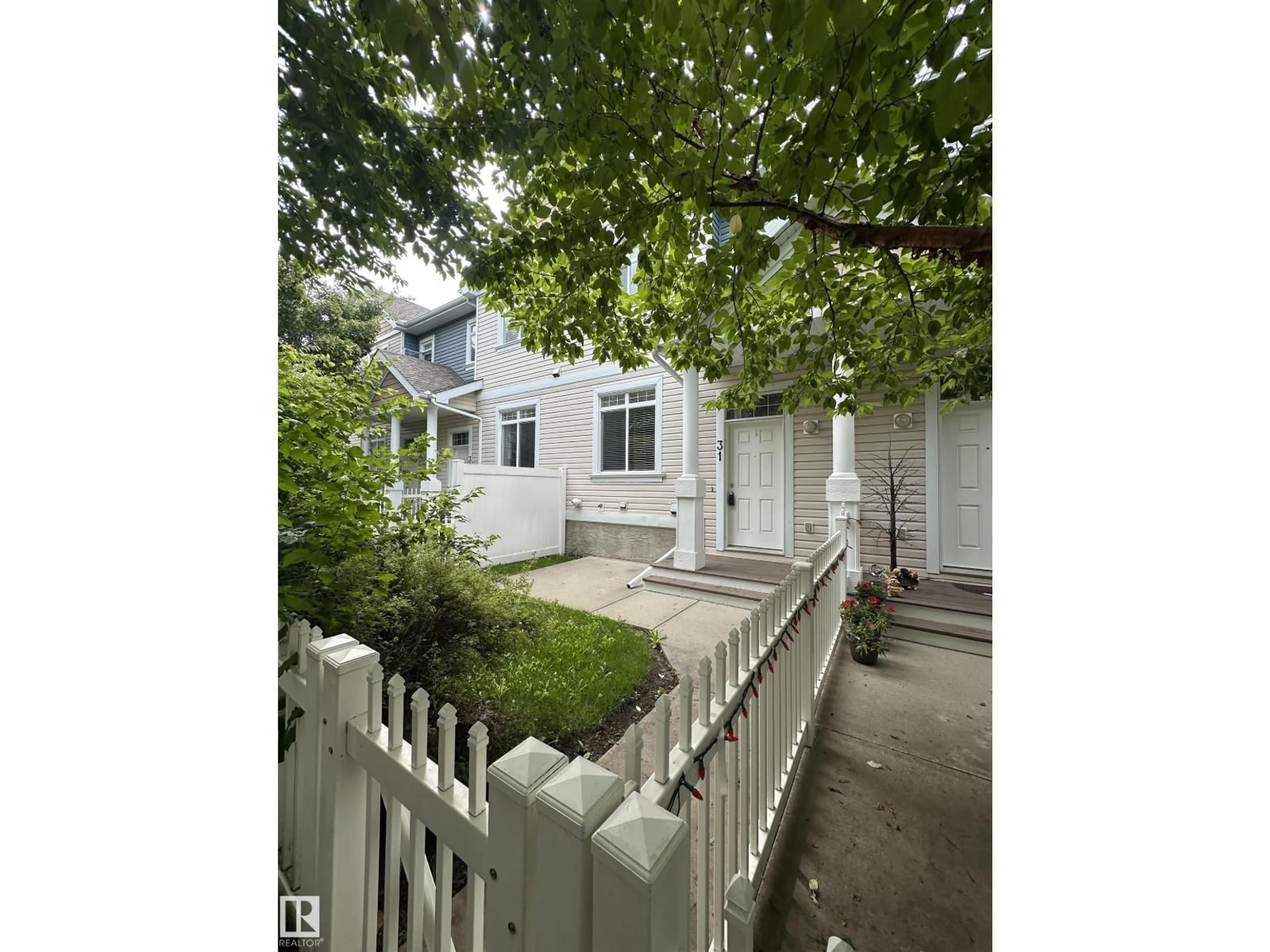 A pic from outside/outdoor area/front of a property/back of a property/a pic from drone, street for #31 - 1804 70 ST, Edmonton Alberta T6X0H4