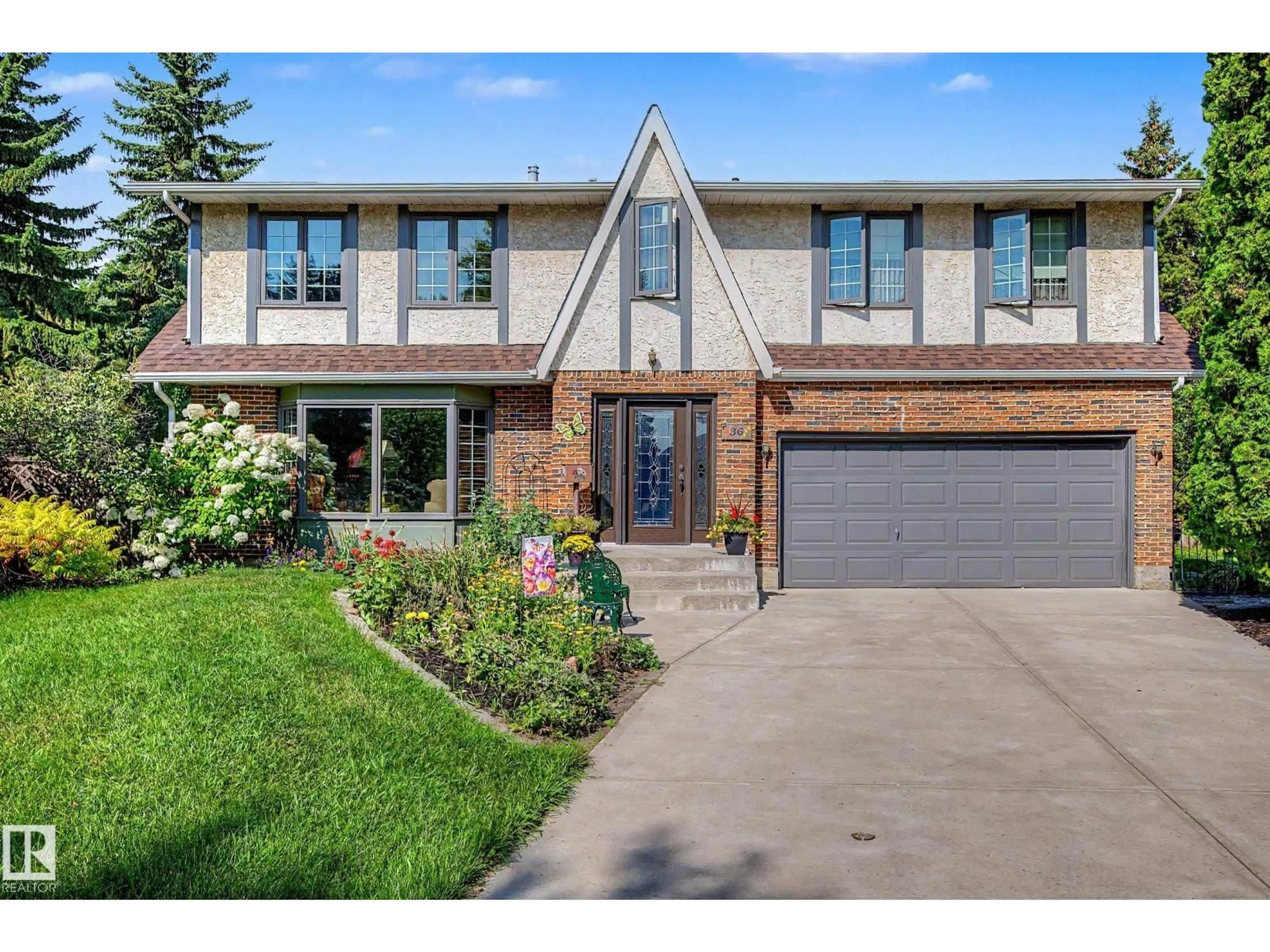 Home with brick exterior material, street for 36 LODGEPOLE CR, St. Albert Alberta T8N2R7