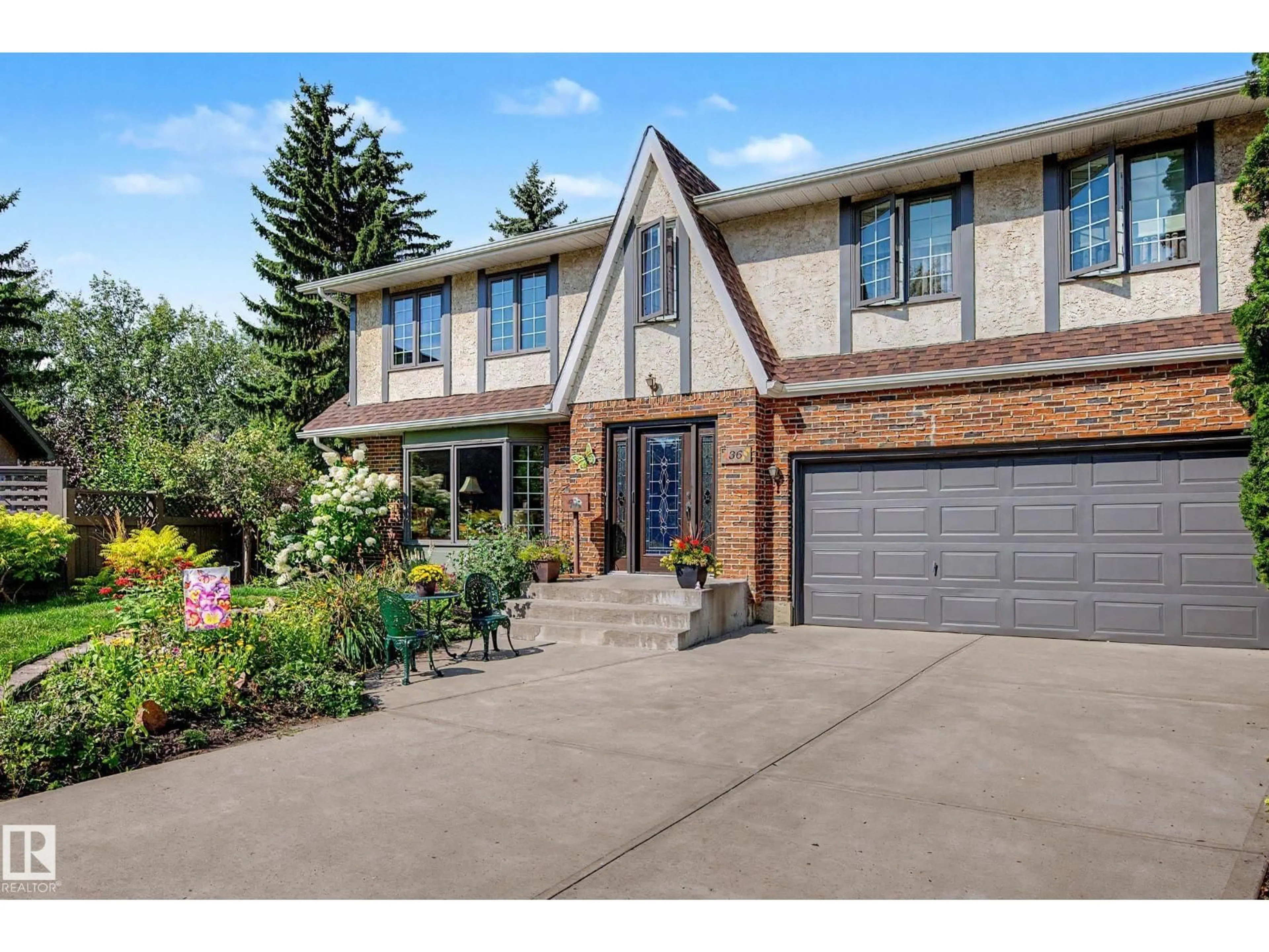 Home with brick exterior material, street for 36 LODGEPOLE CR, St. Albert Alberta T8N2R7