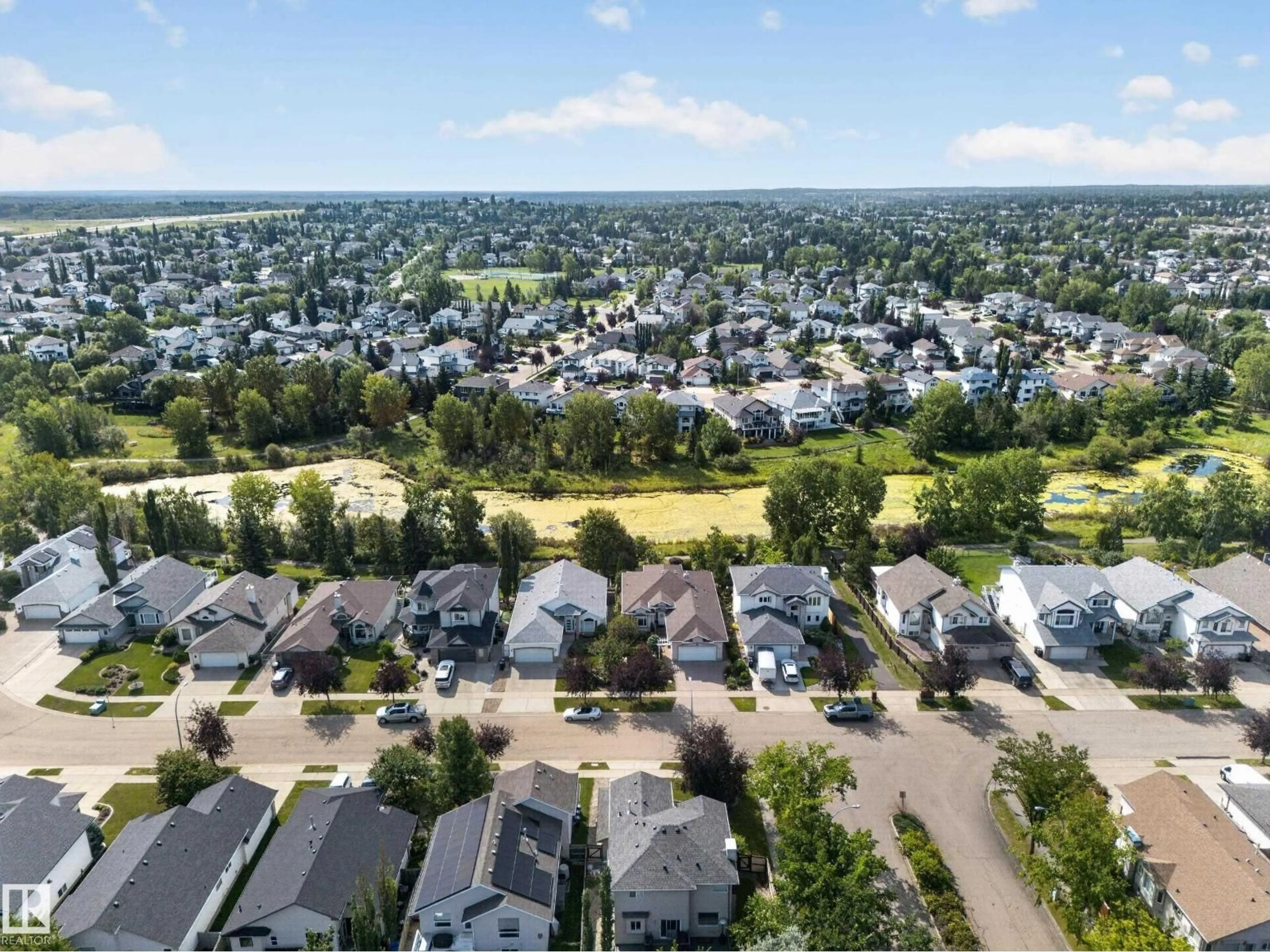 A pic from outside/outdoor area/front of a property/back of a property/a pic from drone, street for 40 MEADOWVIEW PT, Sherwood Park Alberta T8H2E8