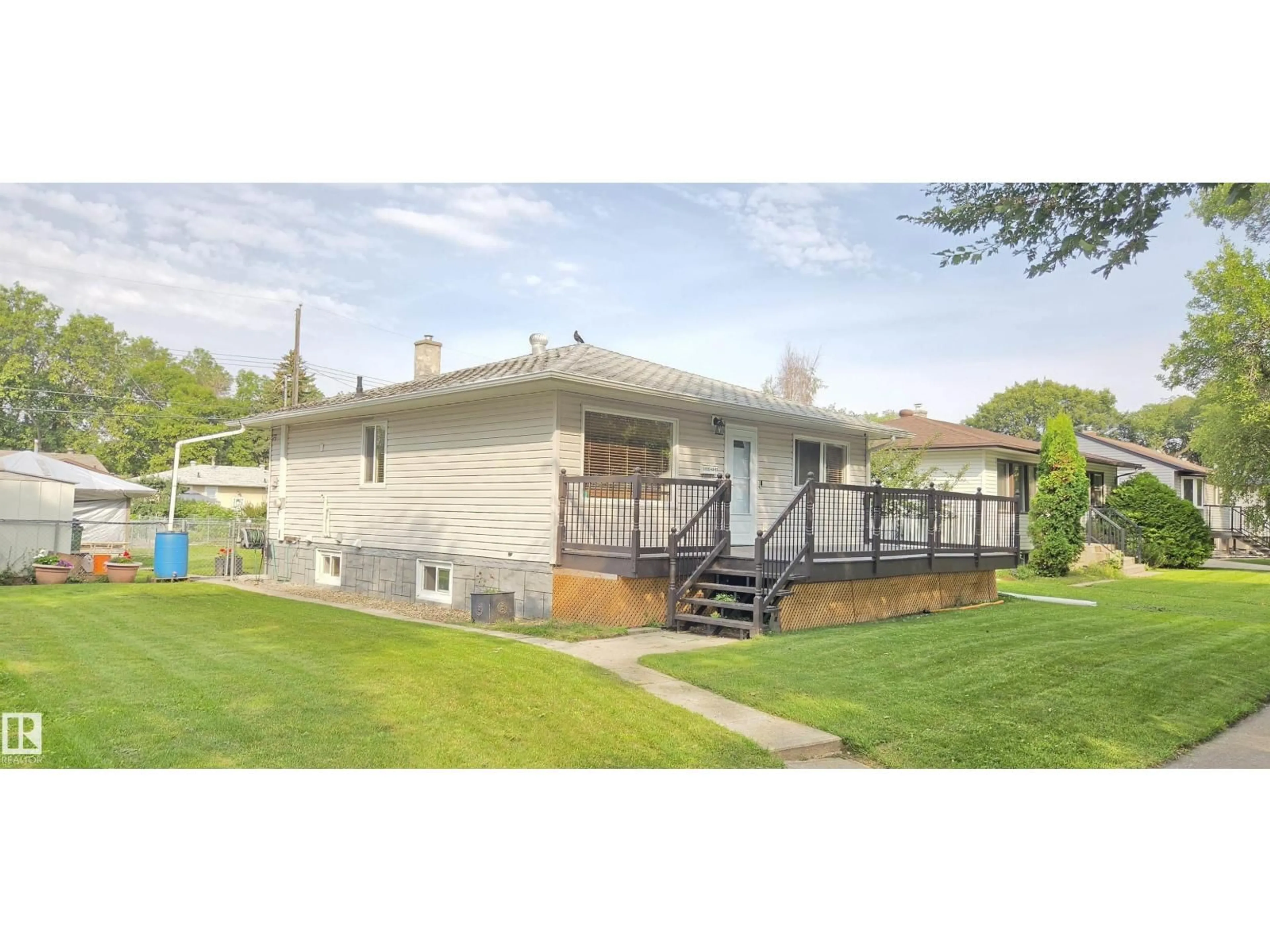 Home with vinyl exterior material, street for 11922 46 ST, Edmonton Alberta T5W2V9