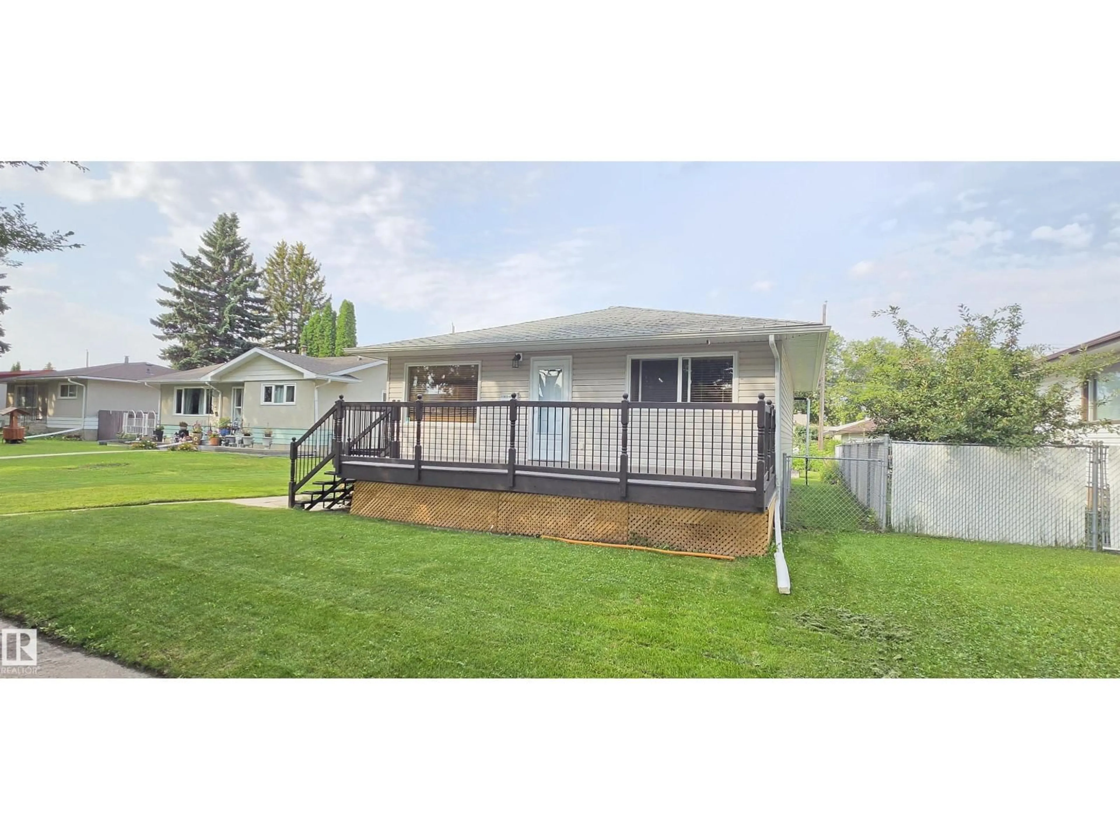 Home with vinyl exterior material, street for 11922 46 ST, Edmonton Alberta T5W2V9