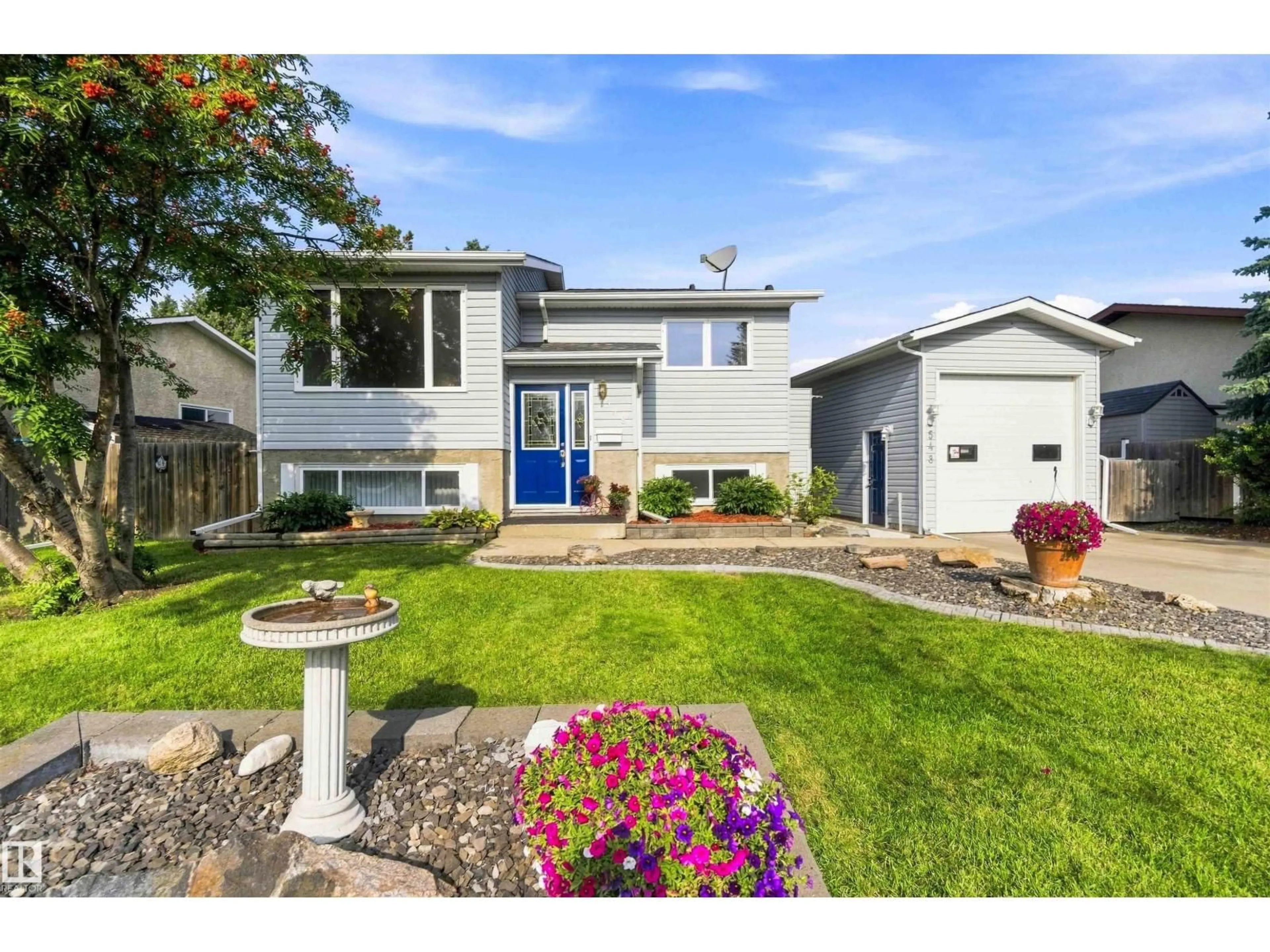 Home with vinyl exterior material, street for 548 SUNNYDALE RD, Morinville Alberta T8R1B8