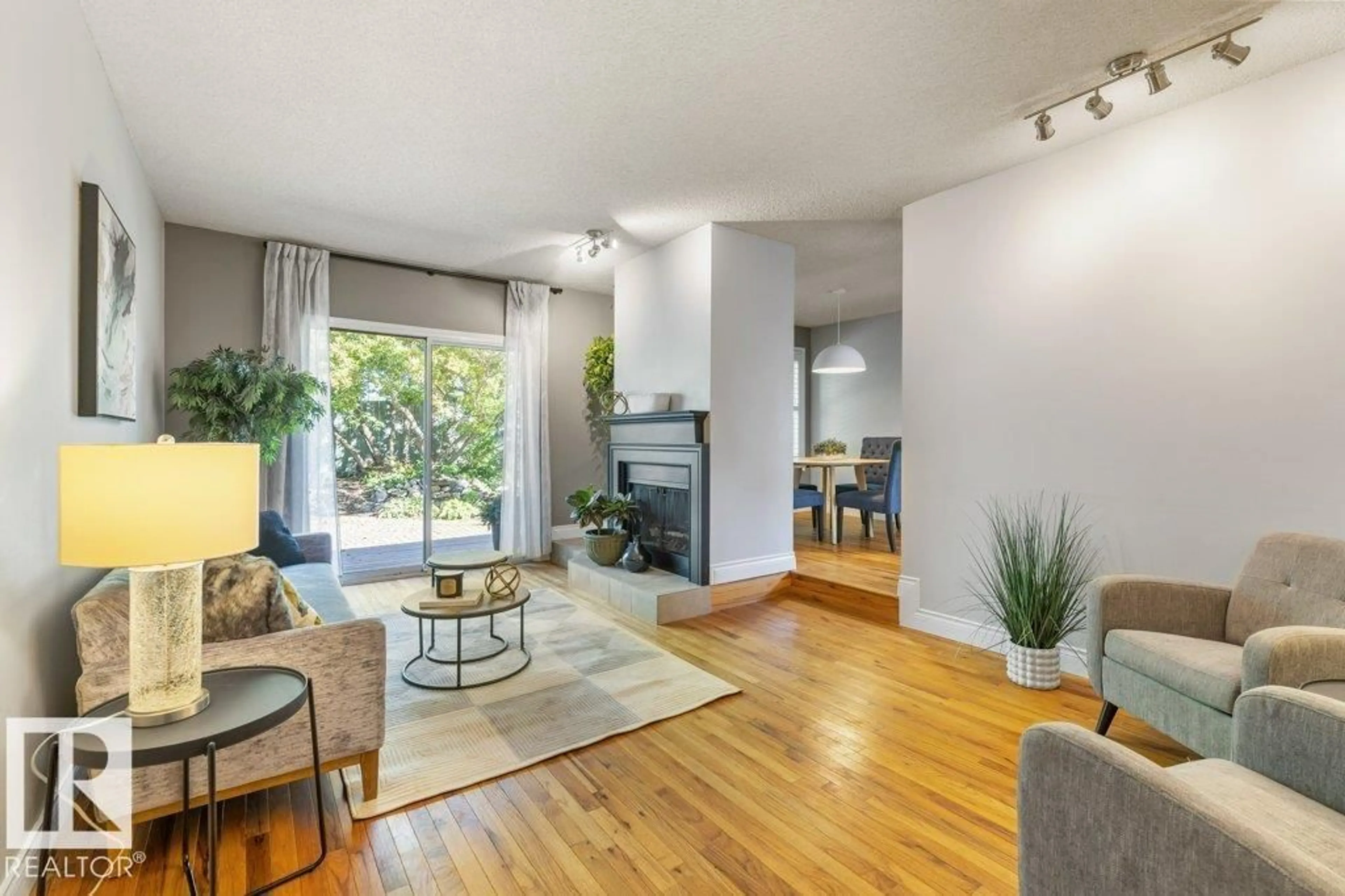 Living room with furniture, unknown for NW - 16715 98 ST, Edmonton Alberta T5X2S8
