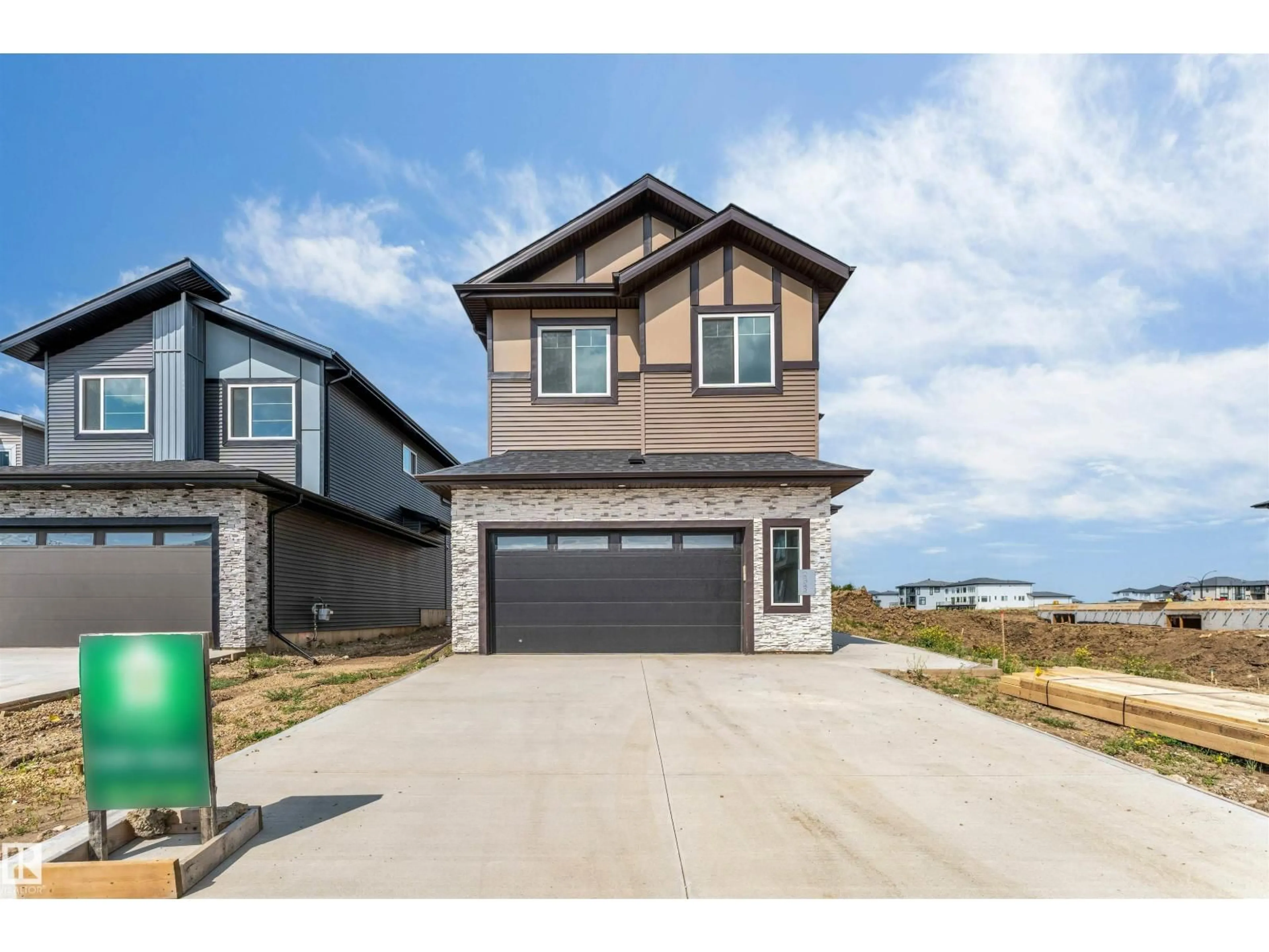 Home with vinyl exterior material, street for 2322 63 AV, Rural Leduc County Alberta T4X3A6