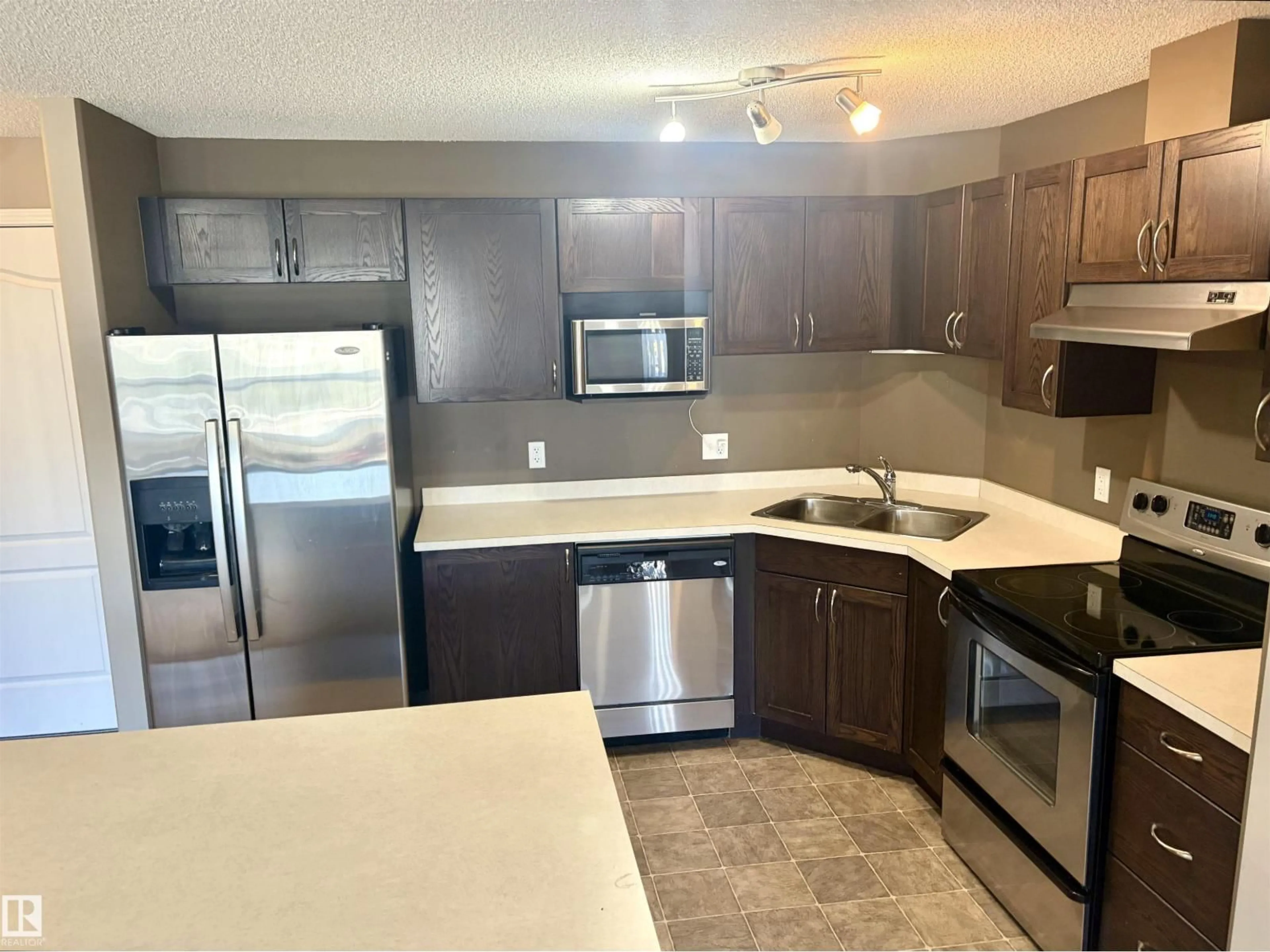 Standard kitchen, ceramic/tile floor for 1304 SIMPSON DR, Edmonton Alberta T6R0N2