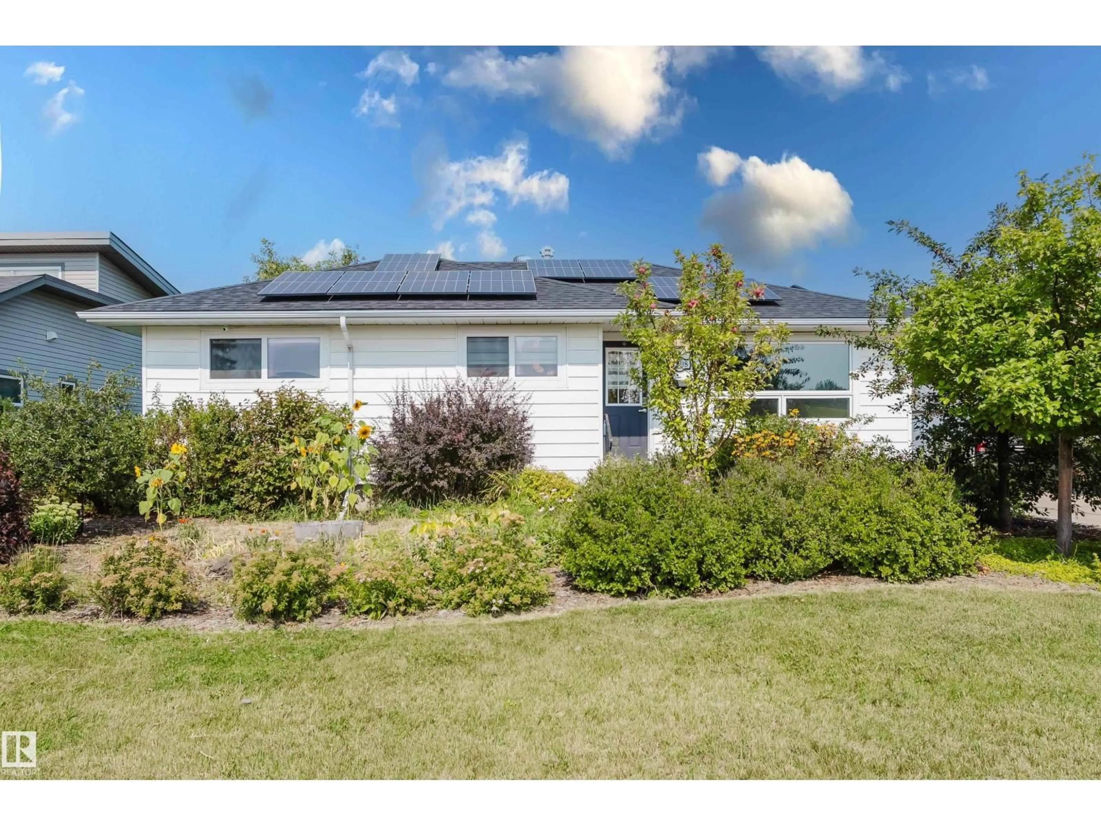 A pic from outside/outdoor area/front of a property/back of a property/a pic from drone, street for 4708 106 AV, Edmonton Alberta T6A1E6