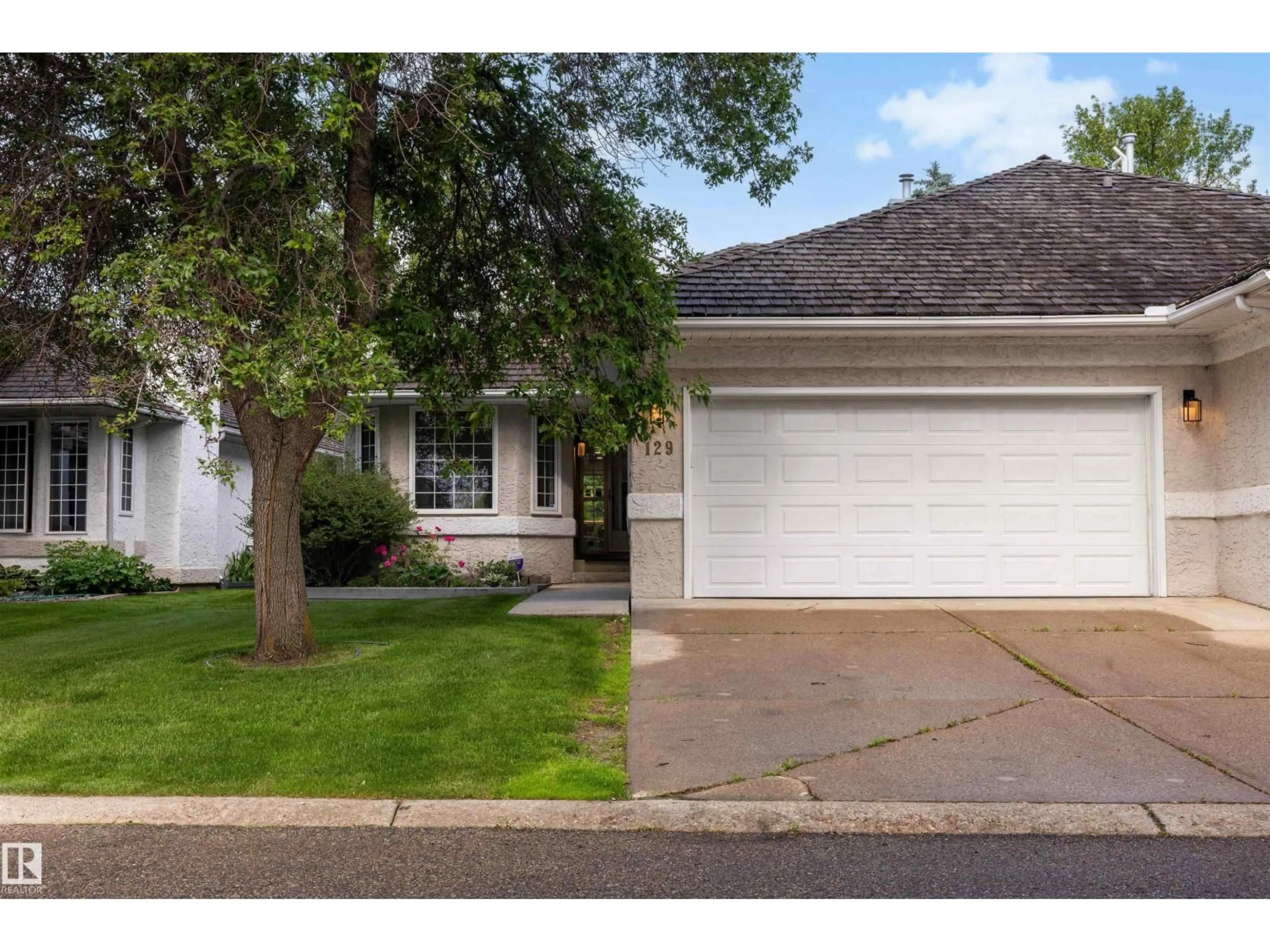 Home with vinyl exterior material, street for 129 IRONWOOD PL, Edmonton Alberta T6J6R4