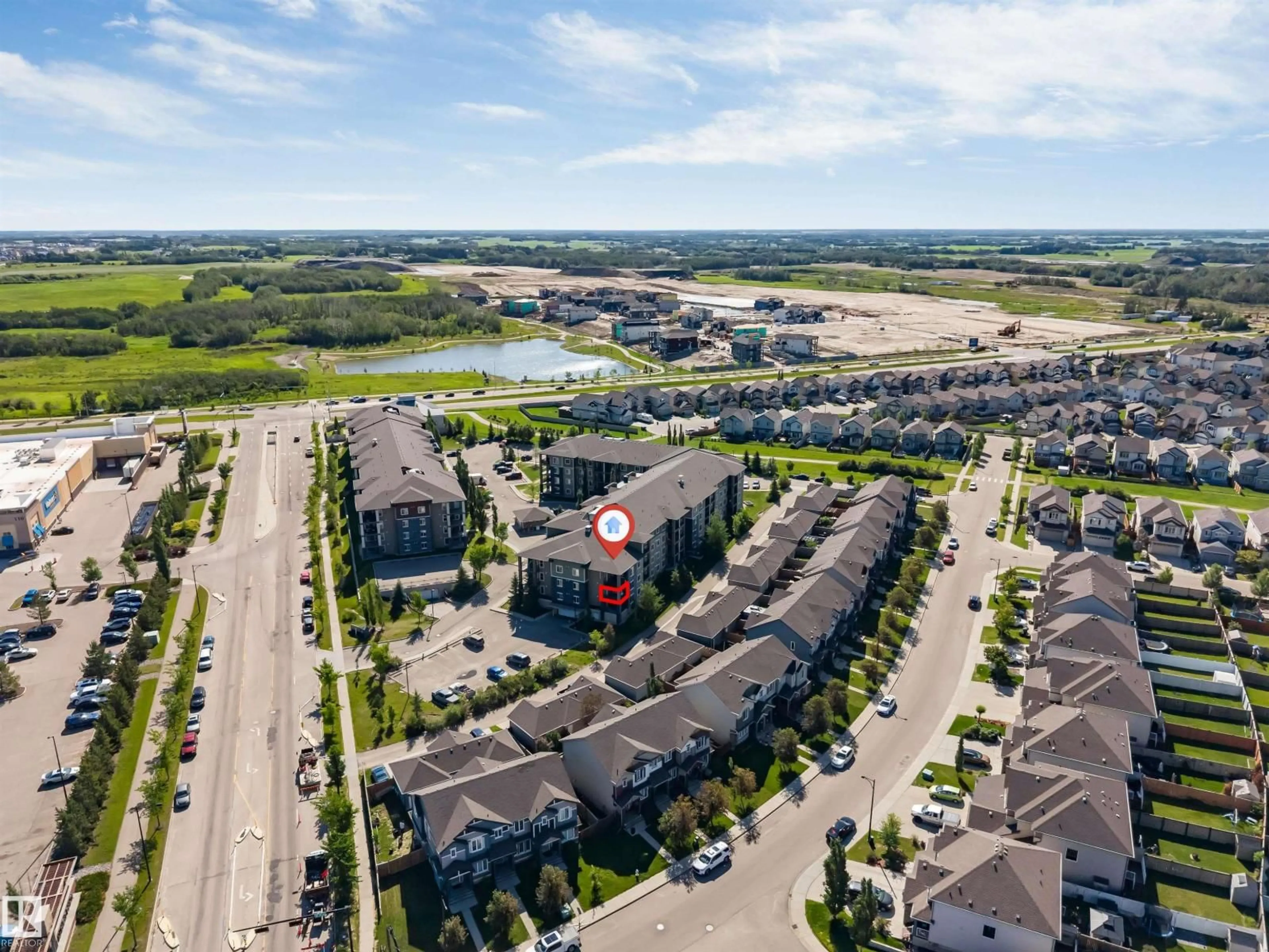 A pic from outside/outdoor area/front of a property/back of a property/a pic from drone, unknown for 225 WATT CM, Edmonton Alberta T6X2C6