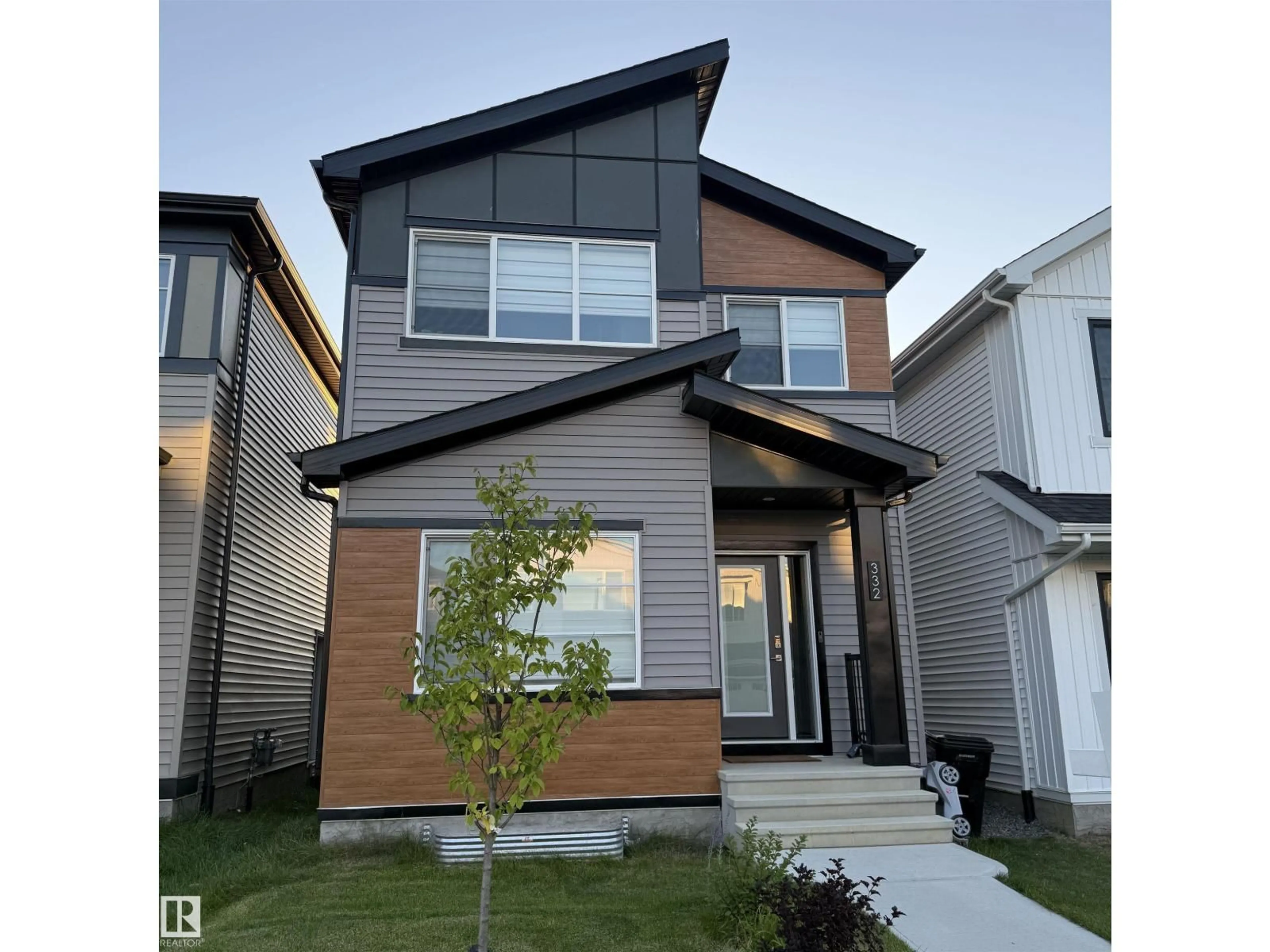 Home with vinyl exterior material, street for SW - 332 29 ST, Edmonton Alberta T6X3E7