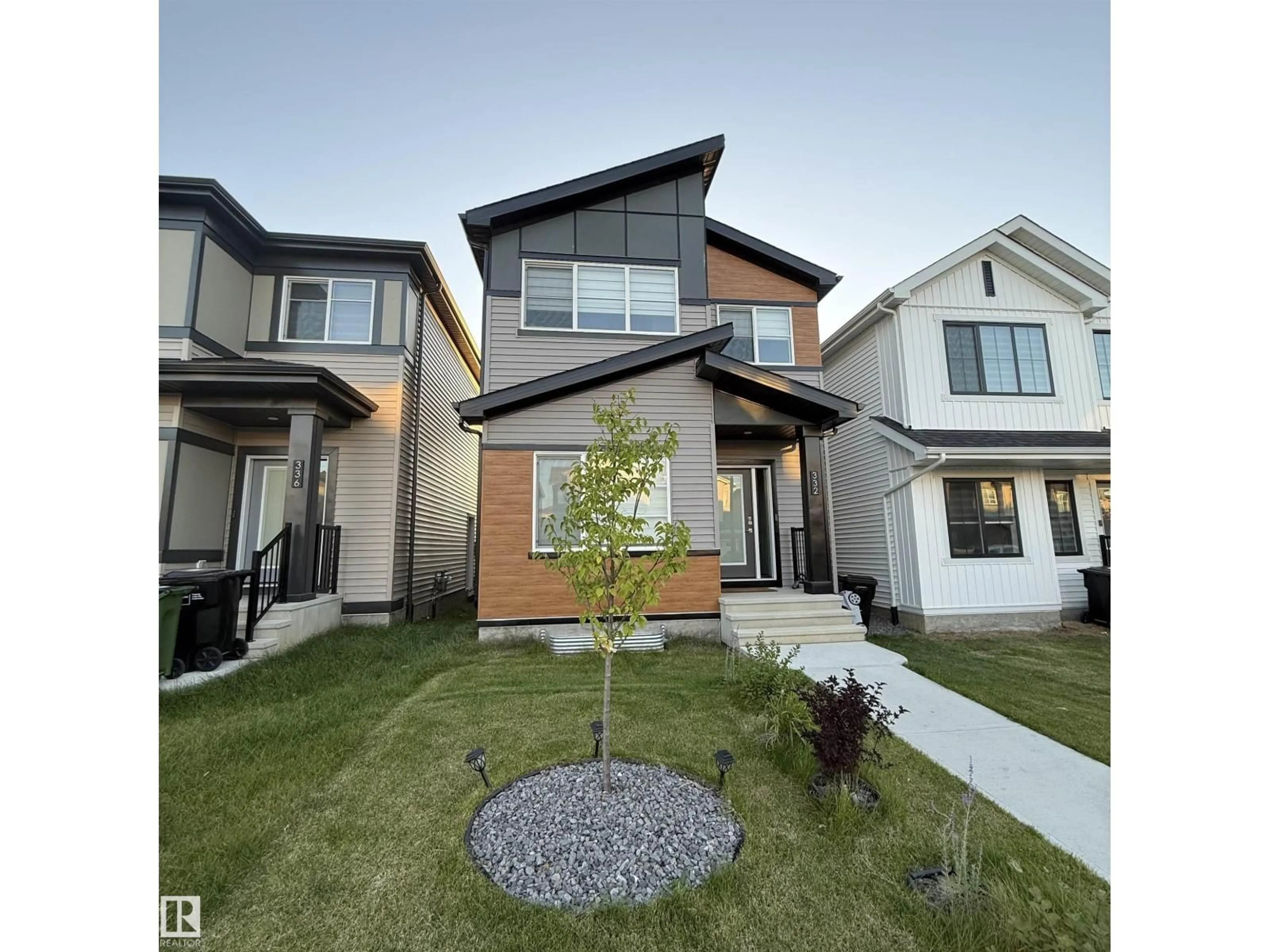 Home with vinyl exterior material, street for SW - 332 29 ST, Edmonton Alberta T6X3E7