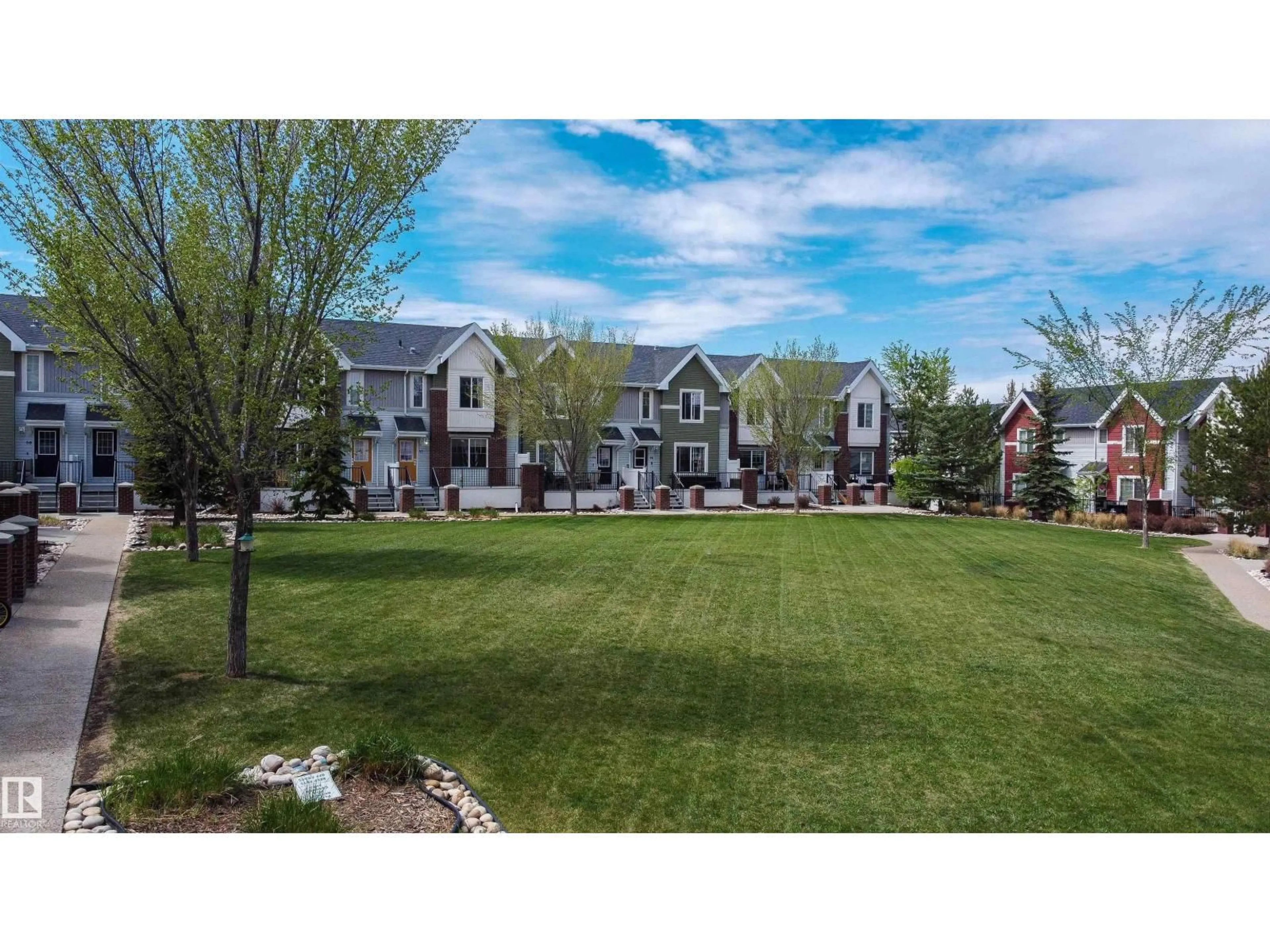 A pic from outside/outdoor area/front of a property/back of a property/a pic from drone, mountain view for 52 2336 ASPEN TR, Sherwood Park Alberta T8A5Z6