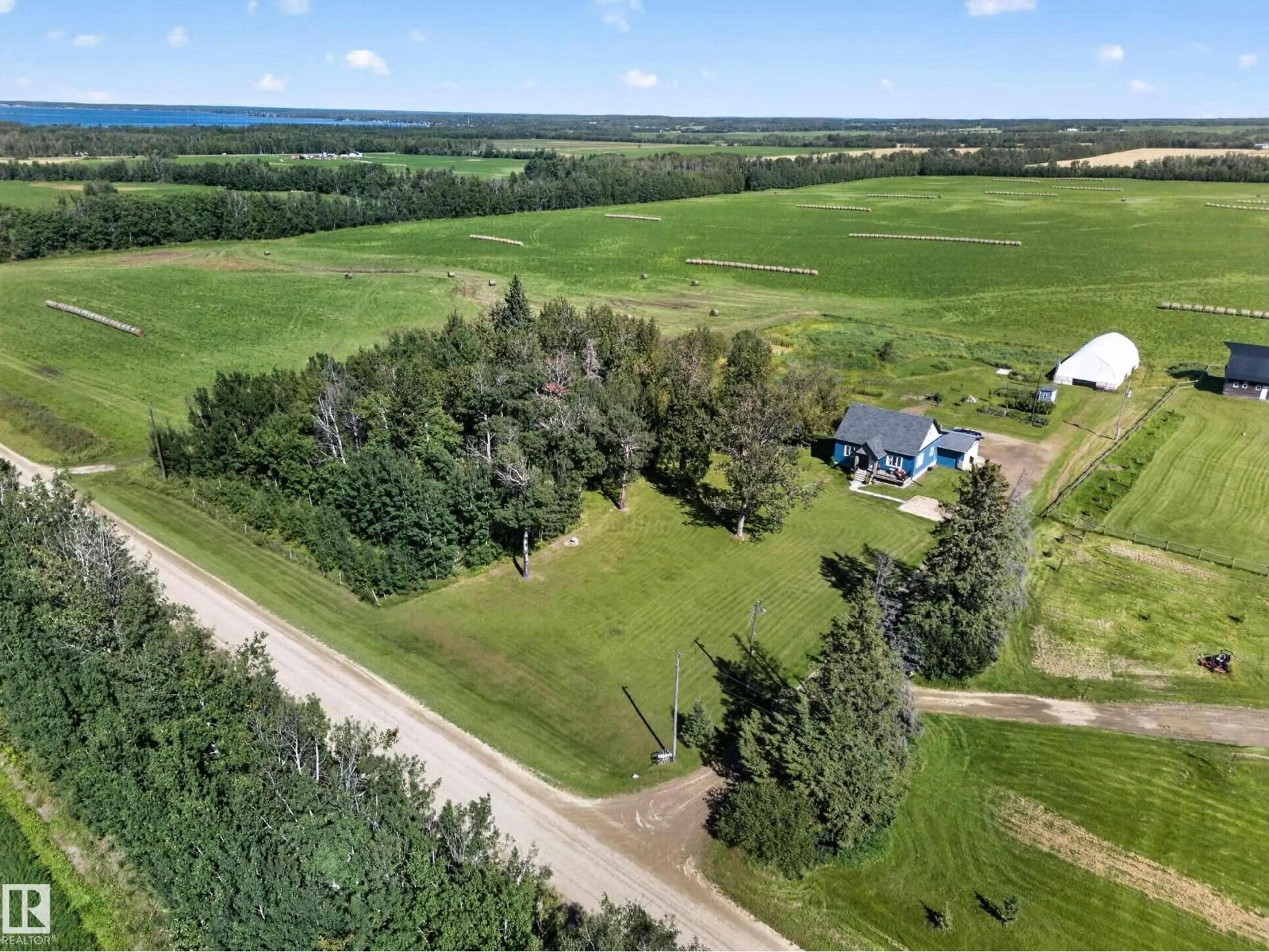 A pic from outside/outdoor area/front of a property/back of a property/a pic from drone, unknown for 54109A RANGE ROAD 34, Rural Lac Ste. Anne County Alberta T0E0A1
