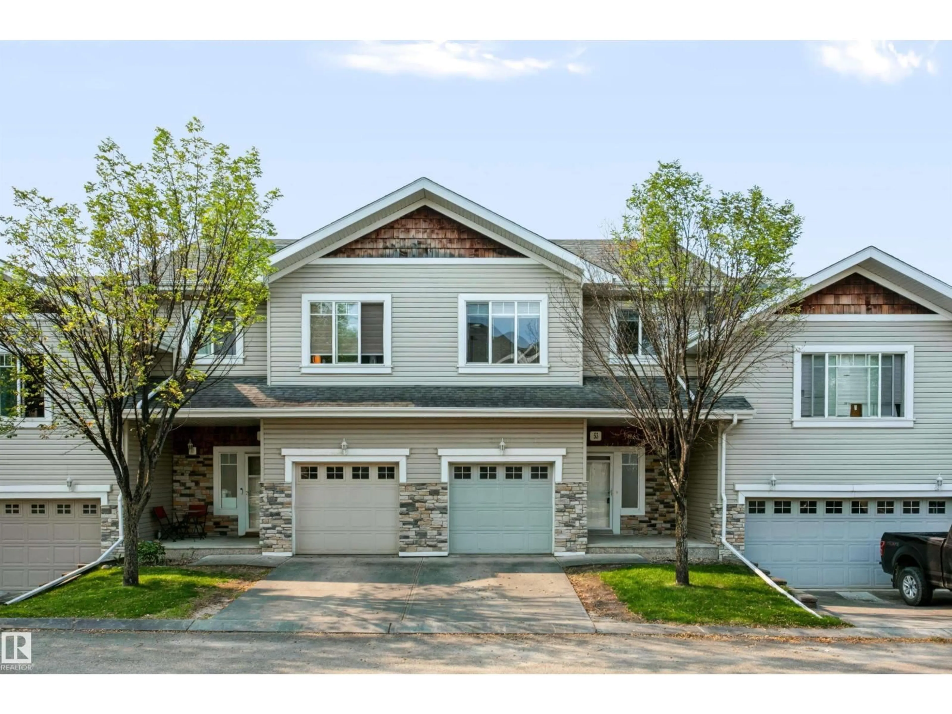 Home with vinyl exterior material, street for #53 - 2508 HANNA CR, Edmonton Alberta T6R3N7