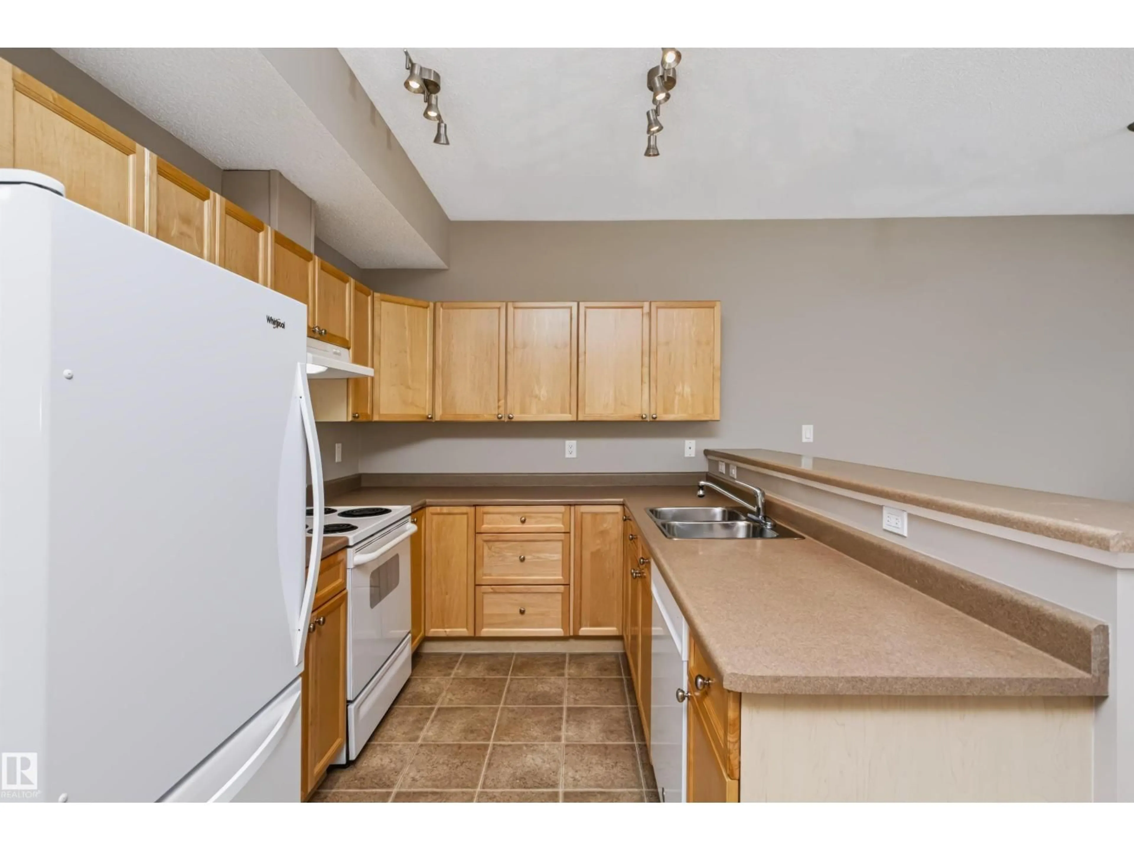 Standard kitchen, unknown for #53 - 2508 HANNA CR, Edmonton Alberta T6R3N7
