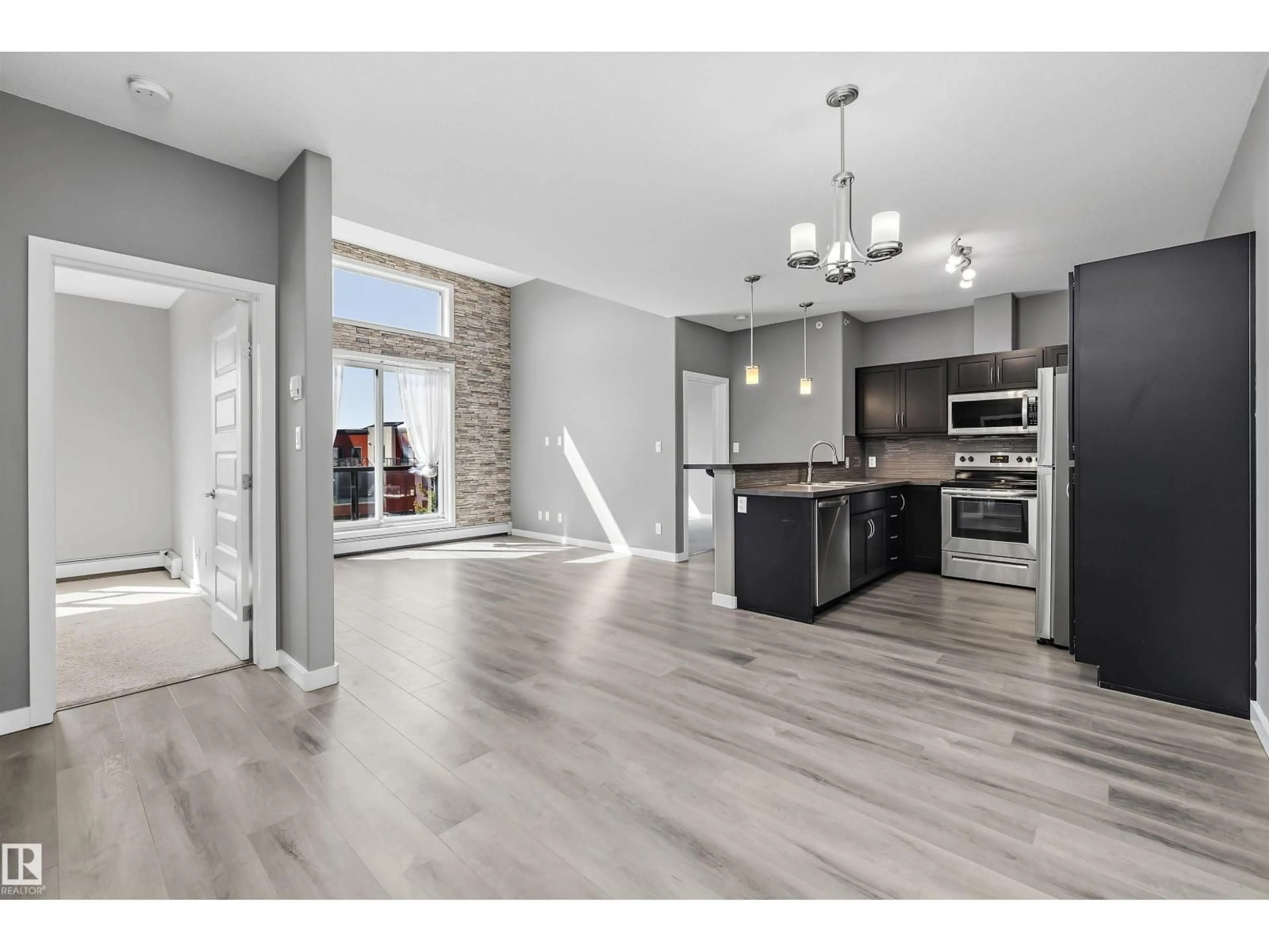 Open concept kitchen, unknown for 304 - 419 AMBLESIDE LI, Edmonton Alberta T6W0V2