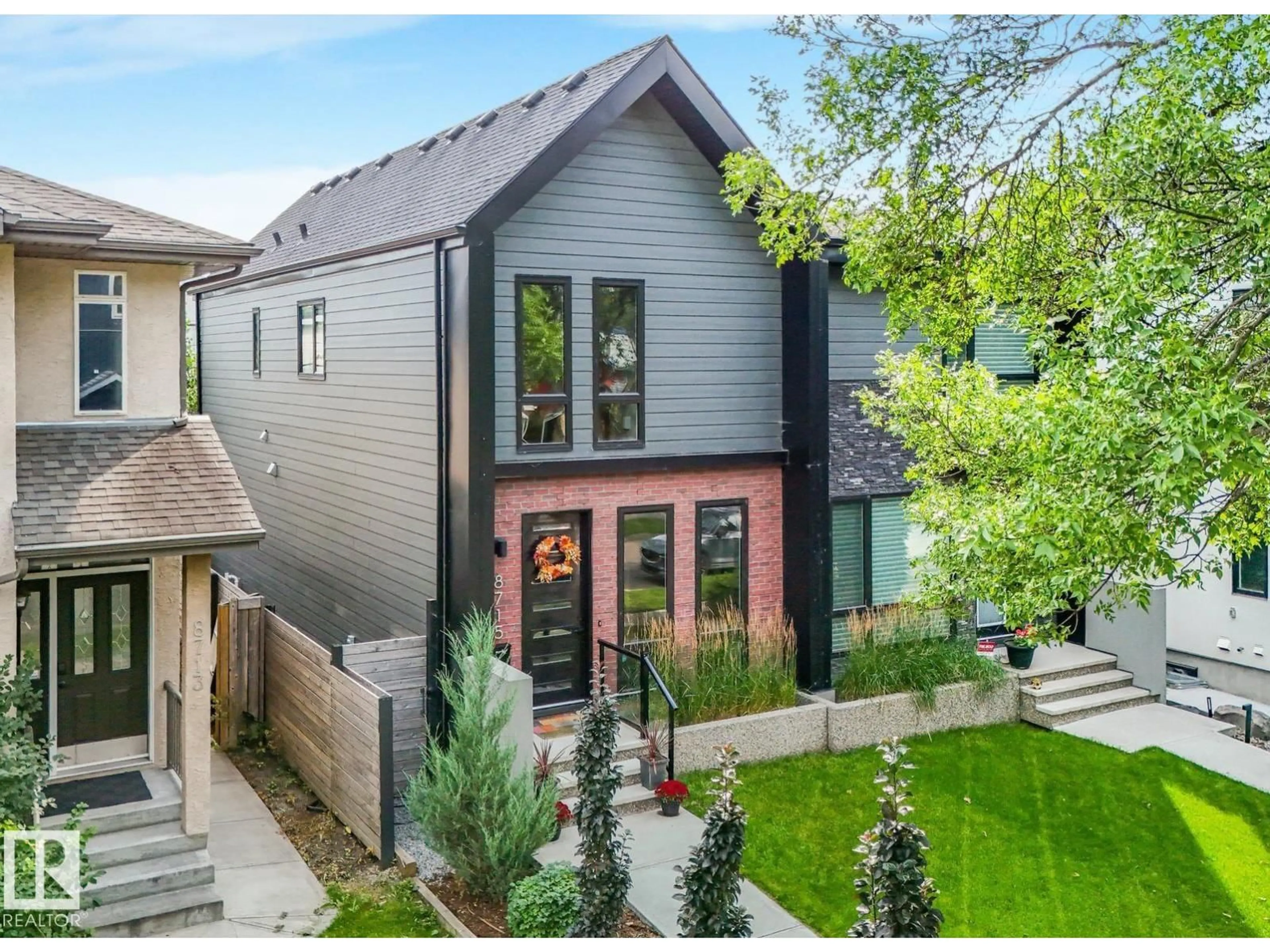 Home with brick exterior material, street for 8715 83 AV, Edmonton Alberta T6C1B2
