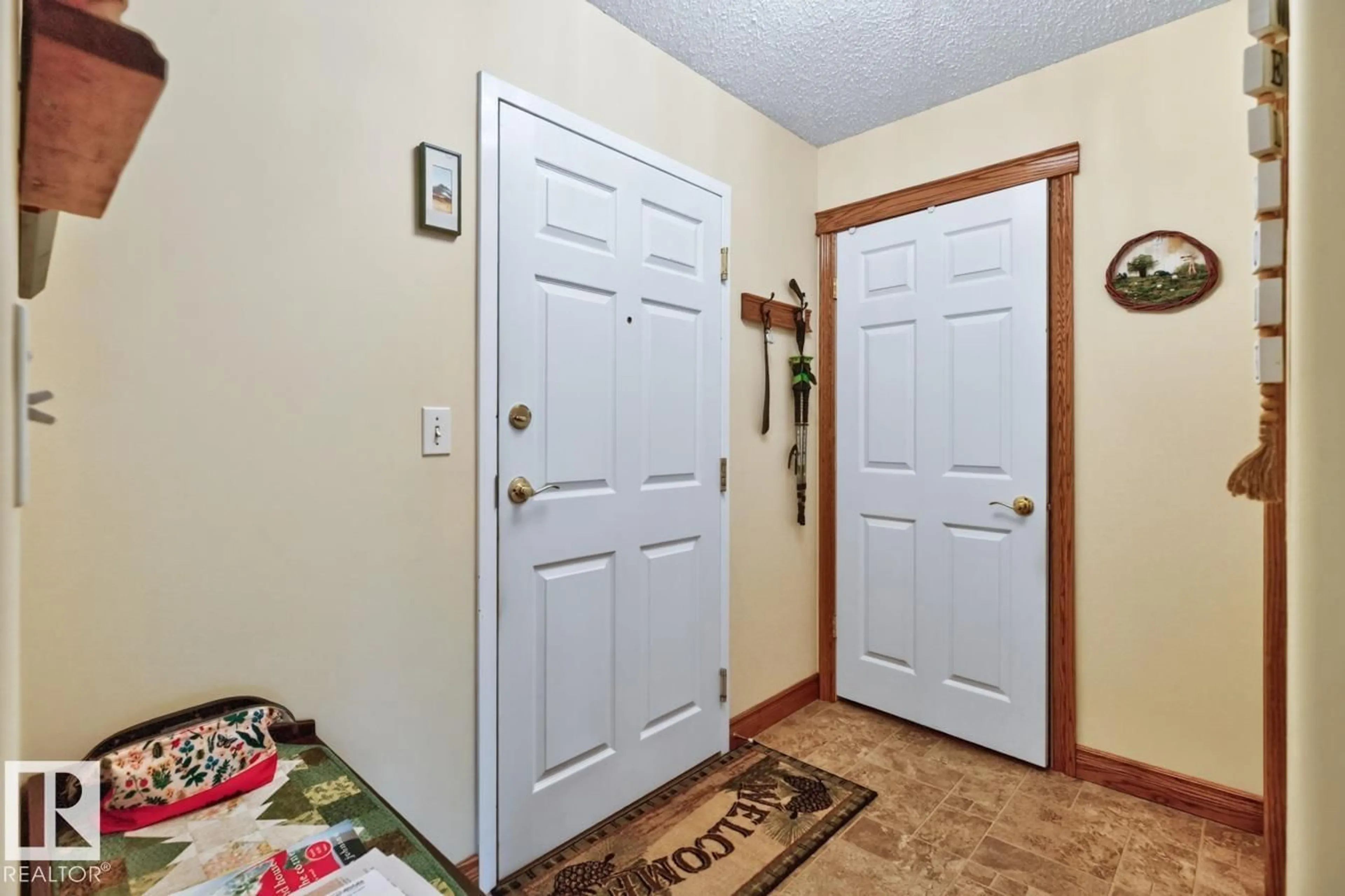 Indoor entryway for #101 - 5116 49 AV, Leduc Alberta T9E8K1