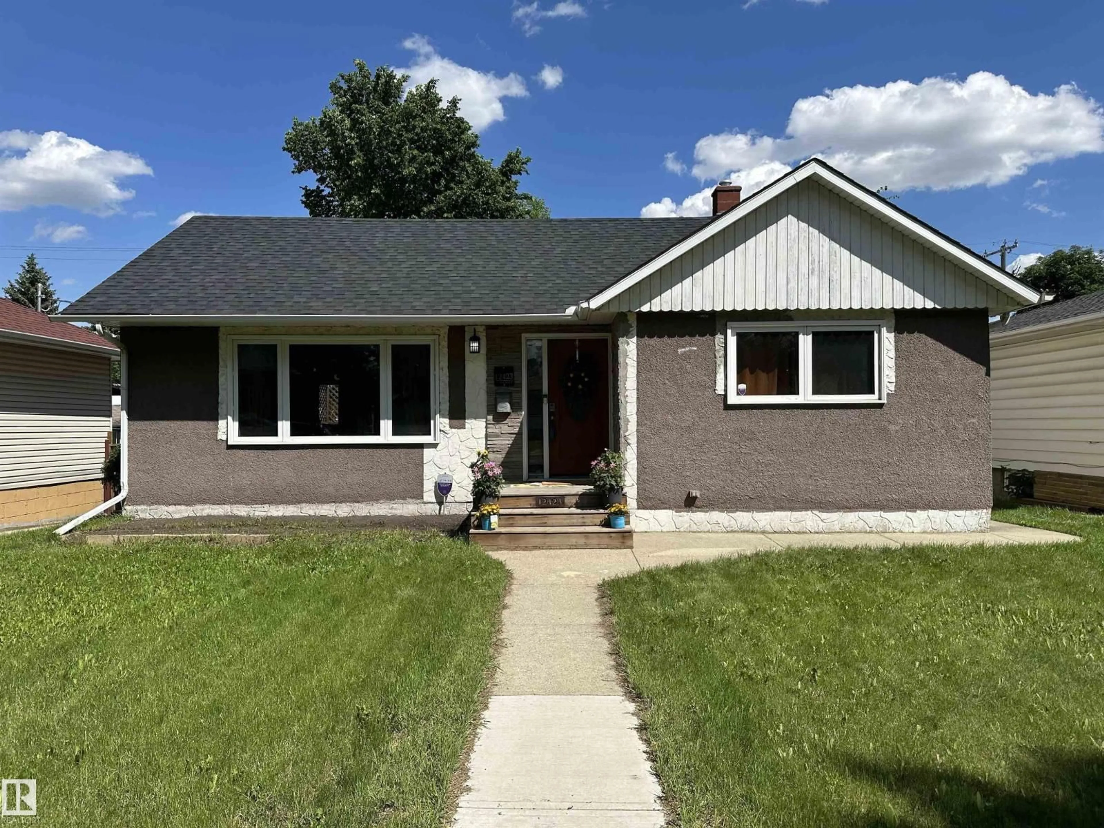 Home with vinyl exterior material, street for NW - 12423 75 ST, Edmonton Alberta T5B2C1
