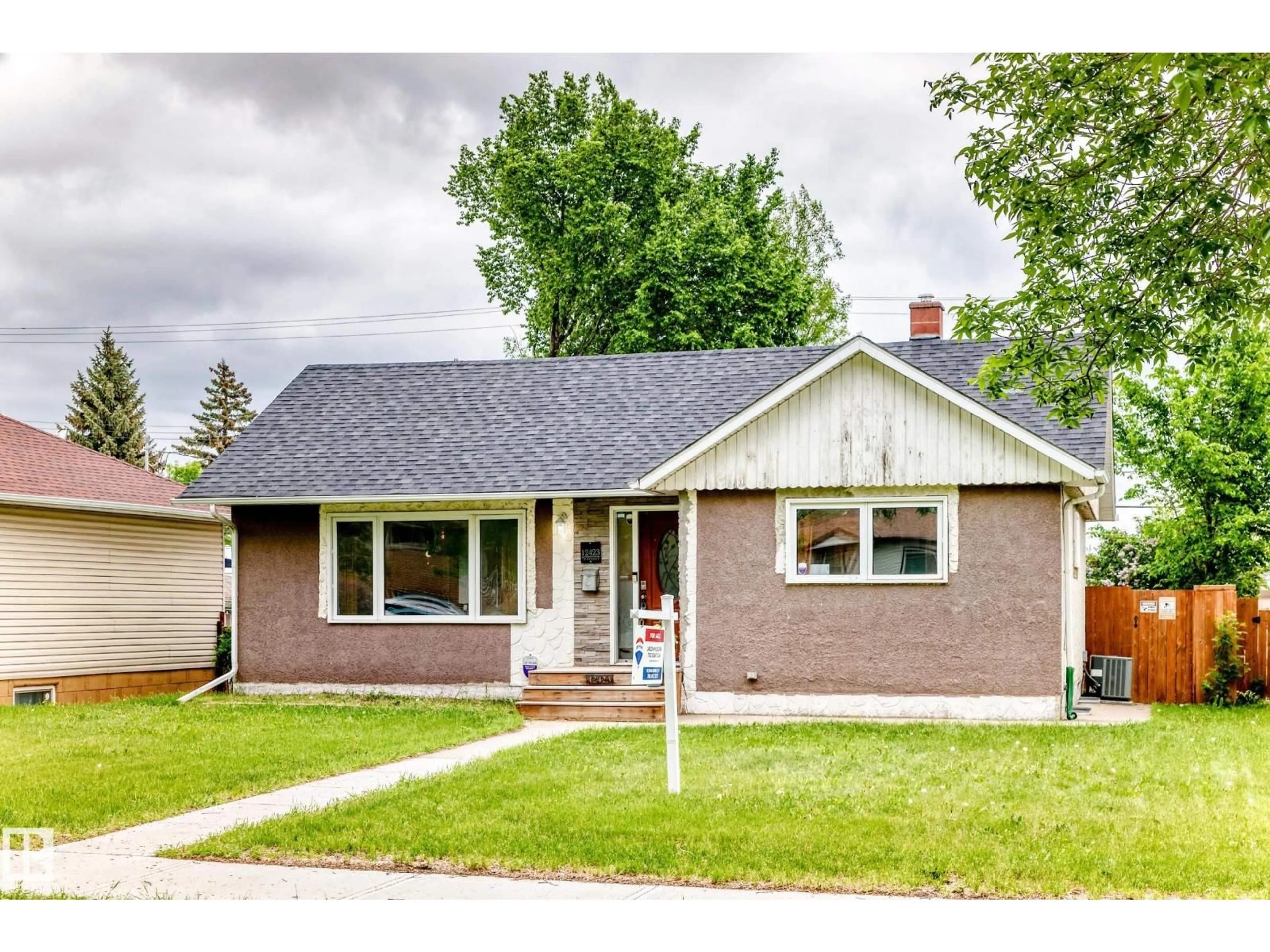 Home with brick exterior material, street for NW - 12423 75 ST, Edmonton Alberta T5B2C1