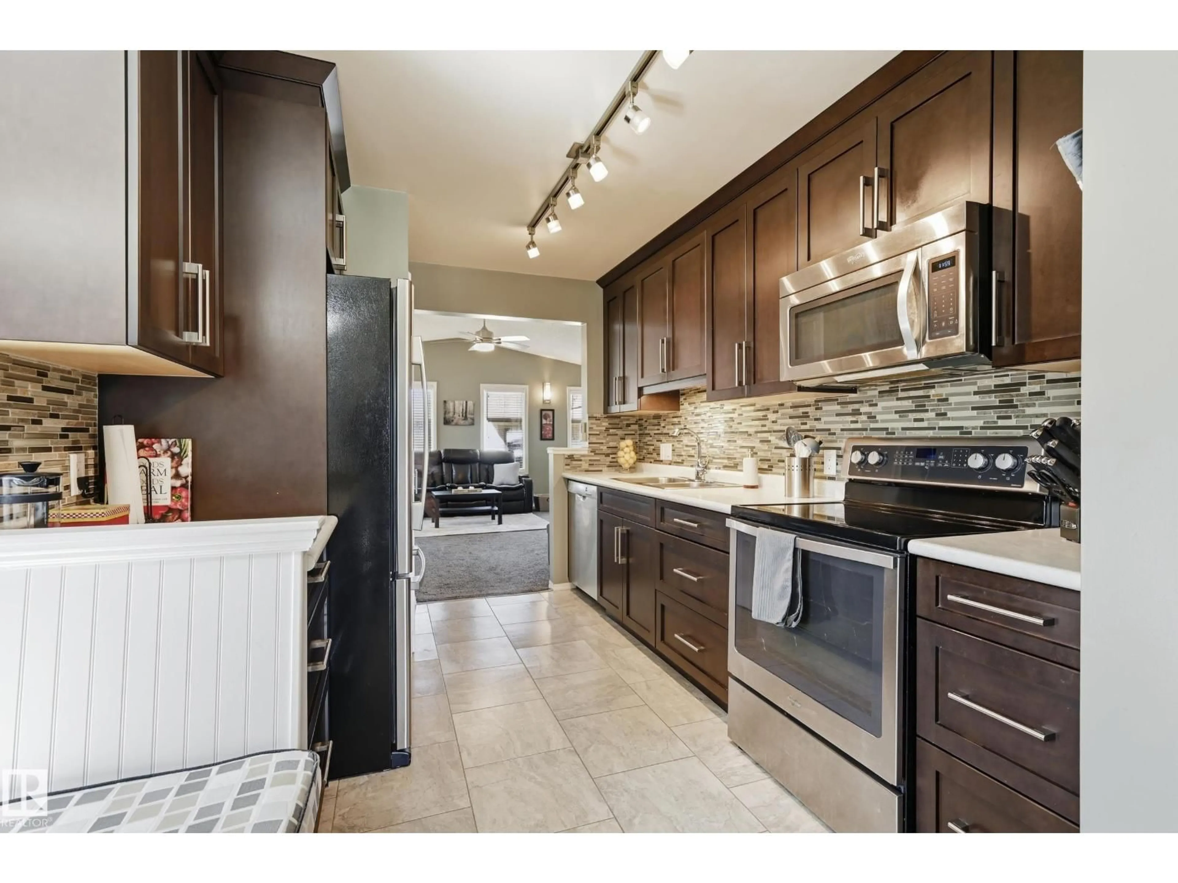 Open concept kitchen, ceramic/tile floor for NW - 10552 45 ST, Edmonton Alberta T6A1X5