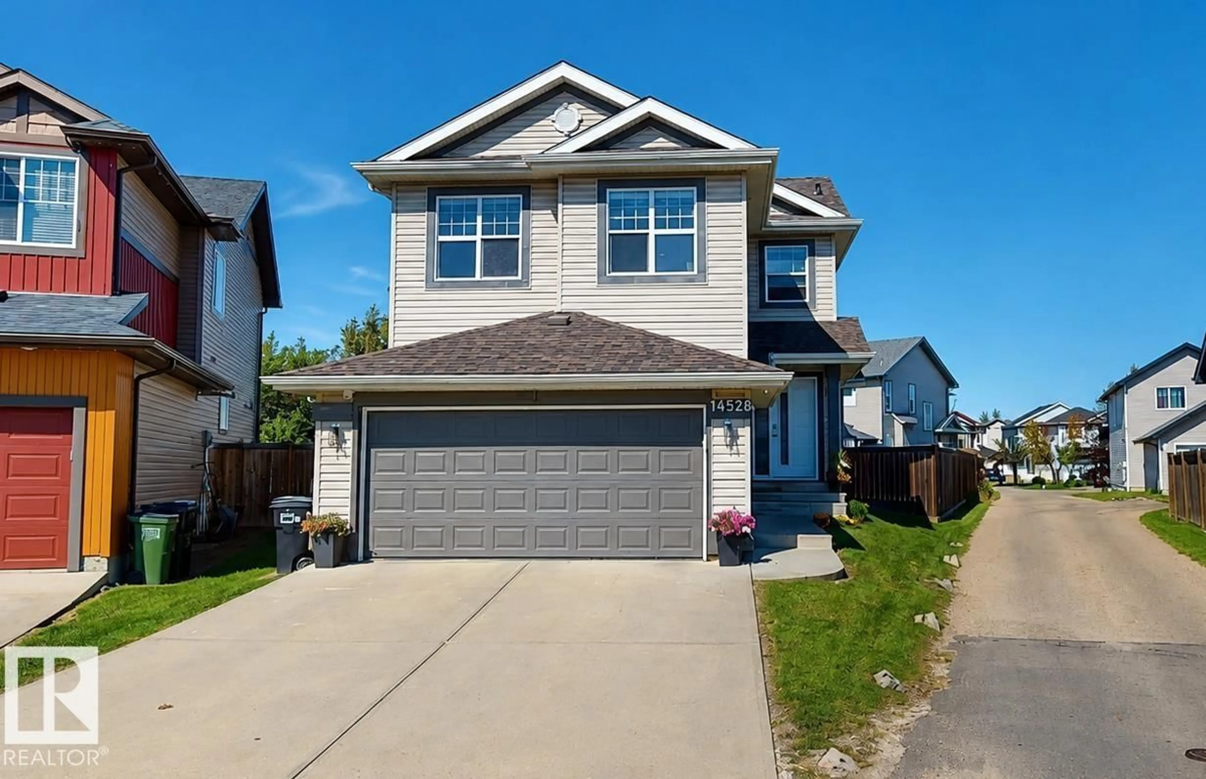 Home with vinyl exterior material, street for NW - 14528 141 ST, Edmonton Alberta T6V1Y1