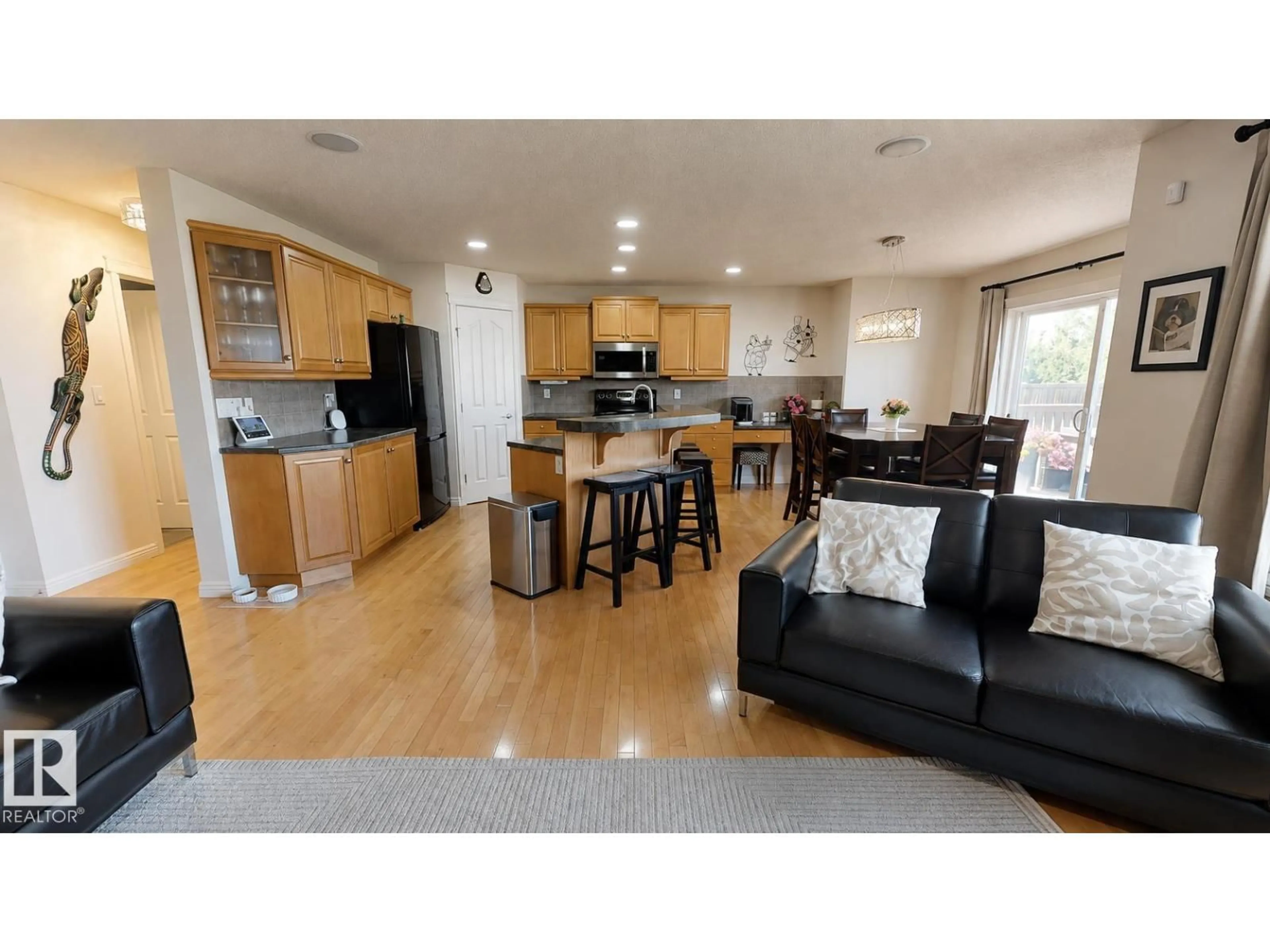 Open concept kitchen, wood/laminate floor for NW - 14528 141 ST, Edmonton Alberta T6V1Y1