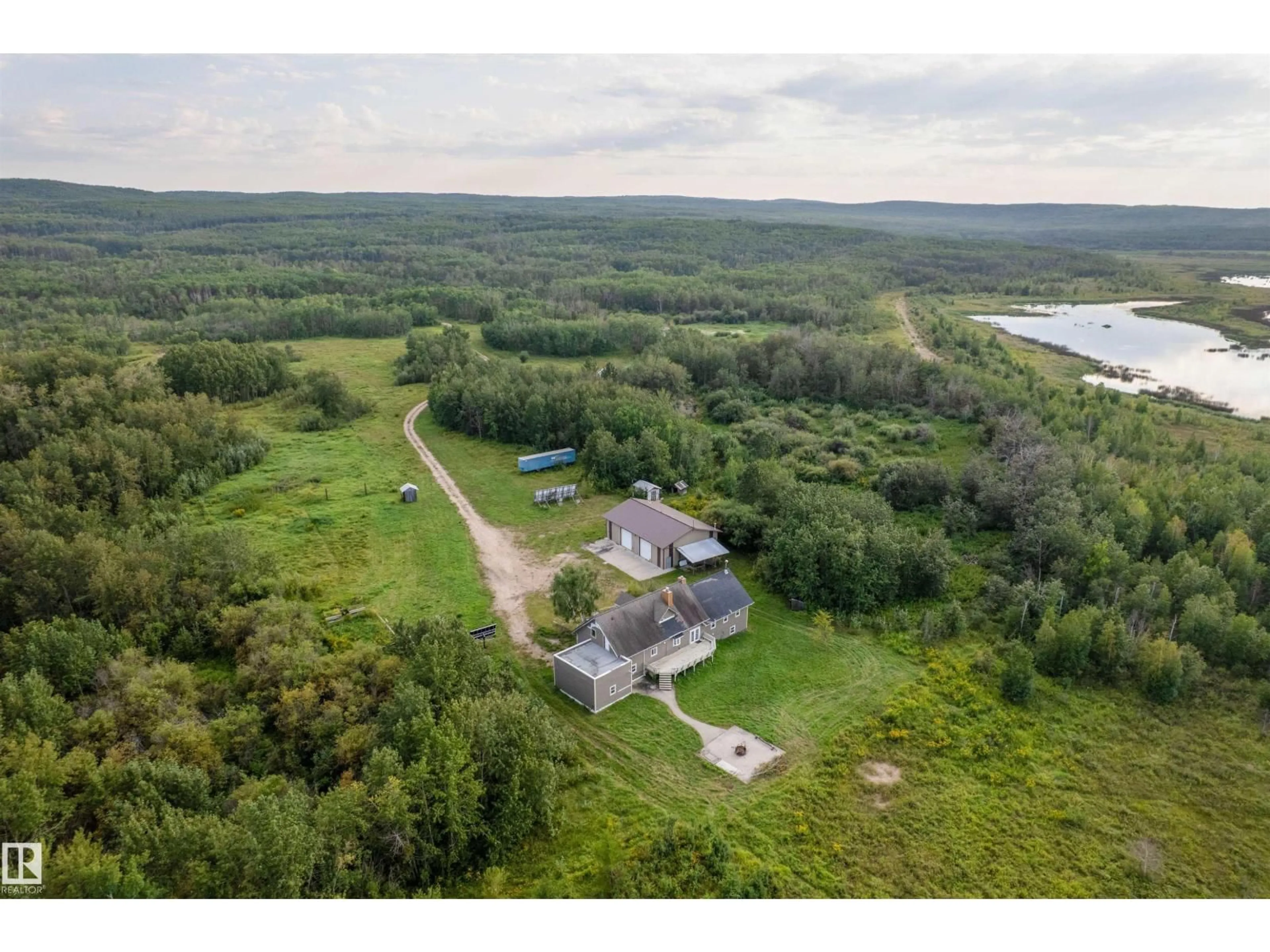 A pic from outside/outdoor area/front of a property/back of a property/a pic from drone, water/lake/river/ocean view for 45116 TOWNSHIP 593A RD, Rural Bonnyville M.D. Alberta T9N2J6