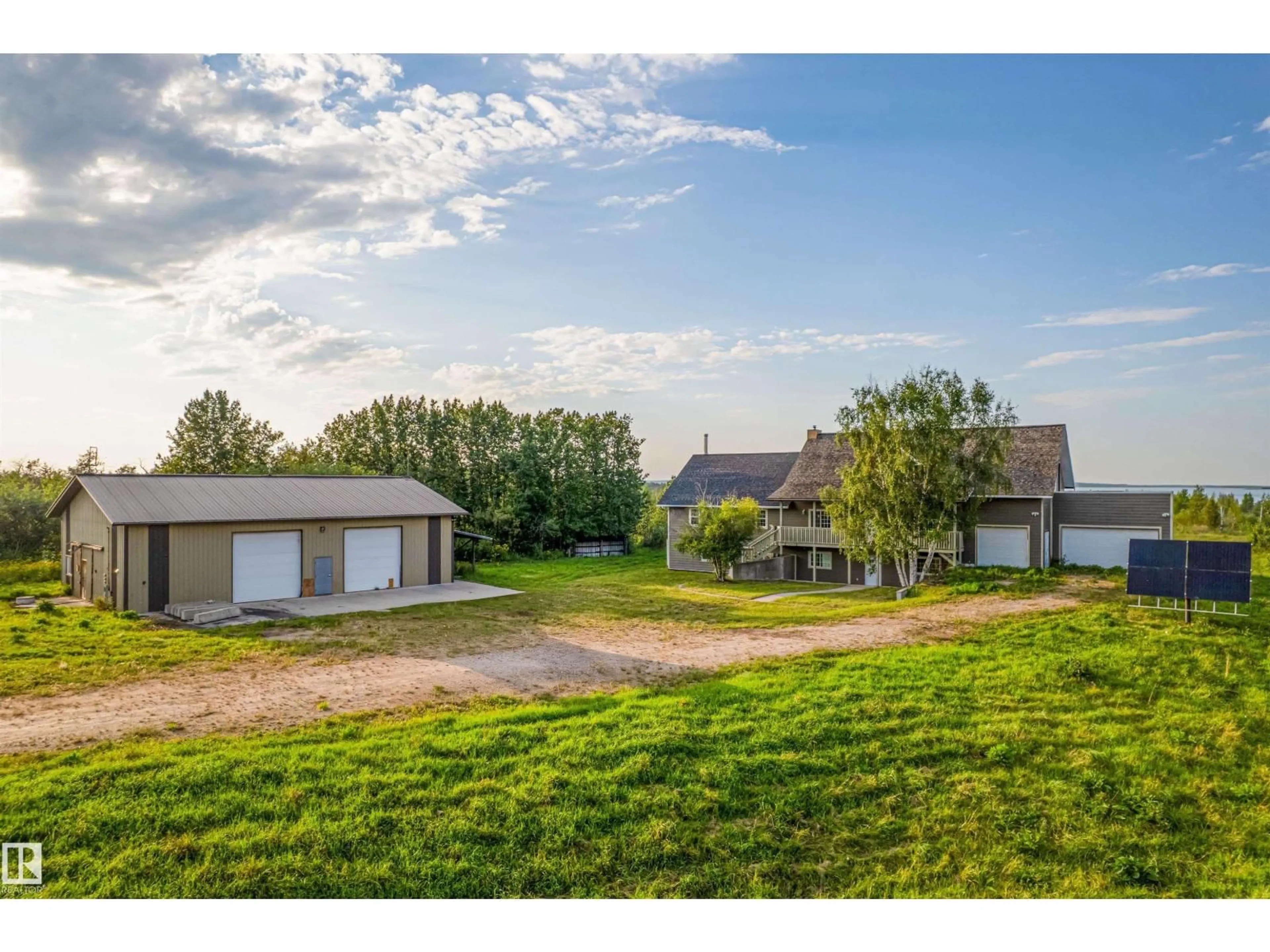 A pic from outside/outdoor area/front of a property/back of a property/a pic from drone, water/lake/river/ocean view for 45116 TOWNSHIP 593A RD, Rural Bonnyville M.D. Alberta T9N2J6