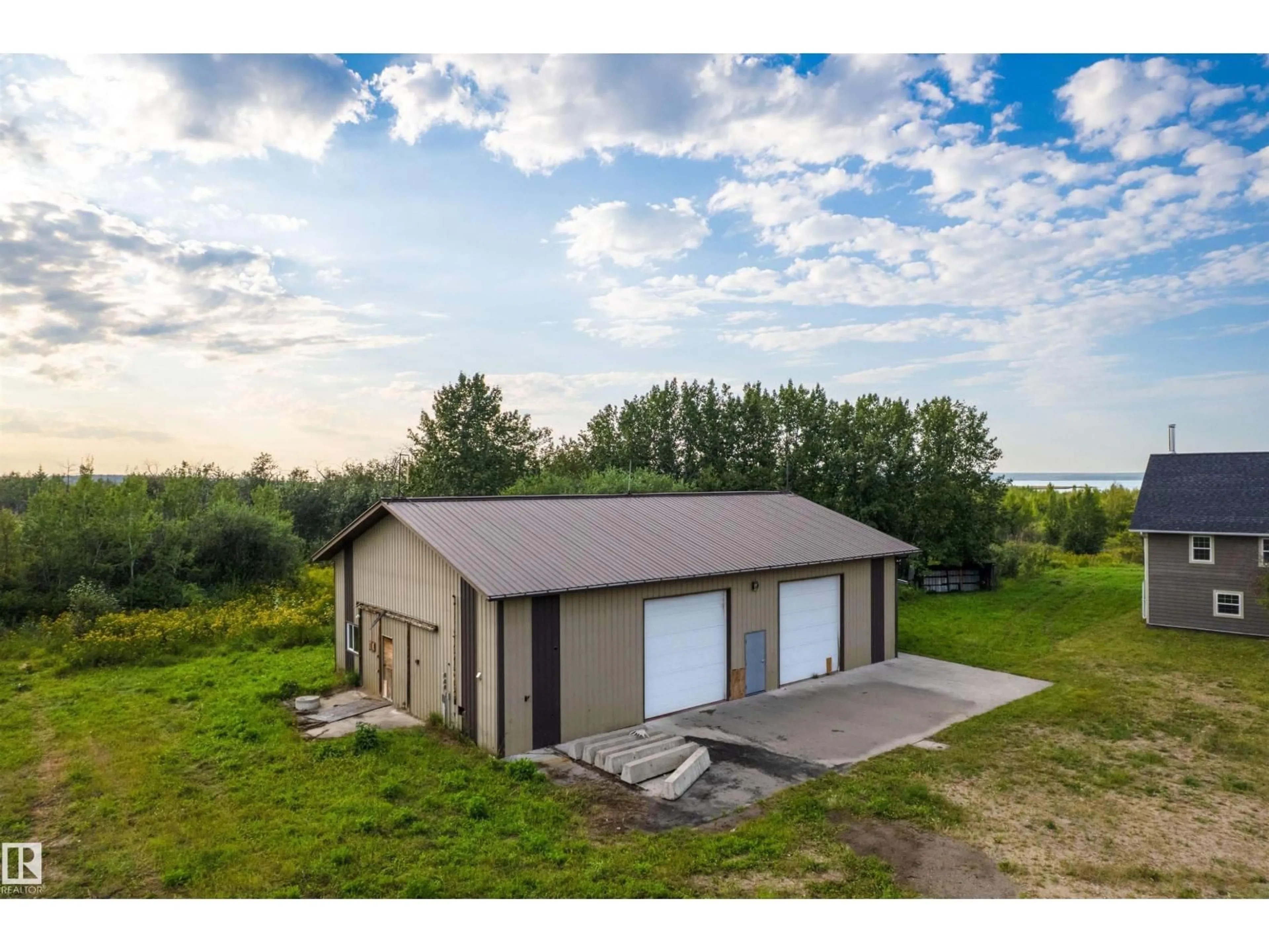 A pic from outside/outdoor area/front of a property/back of a property/a pic from drone, water/lake/river/ocean view for 45116 TOWNSHIP 593A RD, Rural Bonnyville M.D. Alberta T9N2J6
